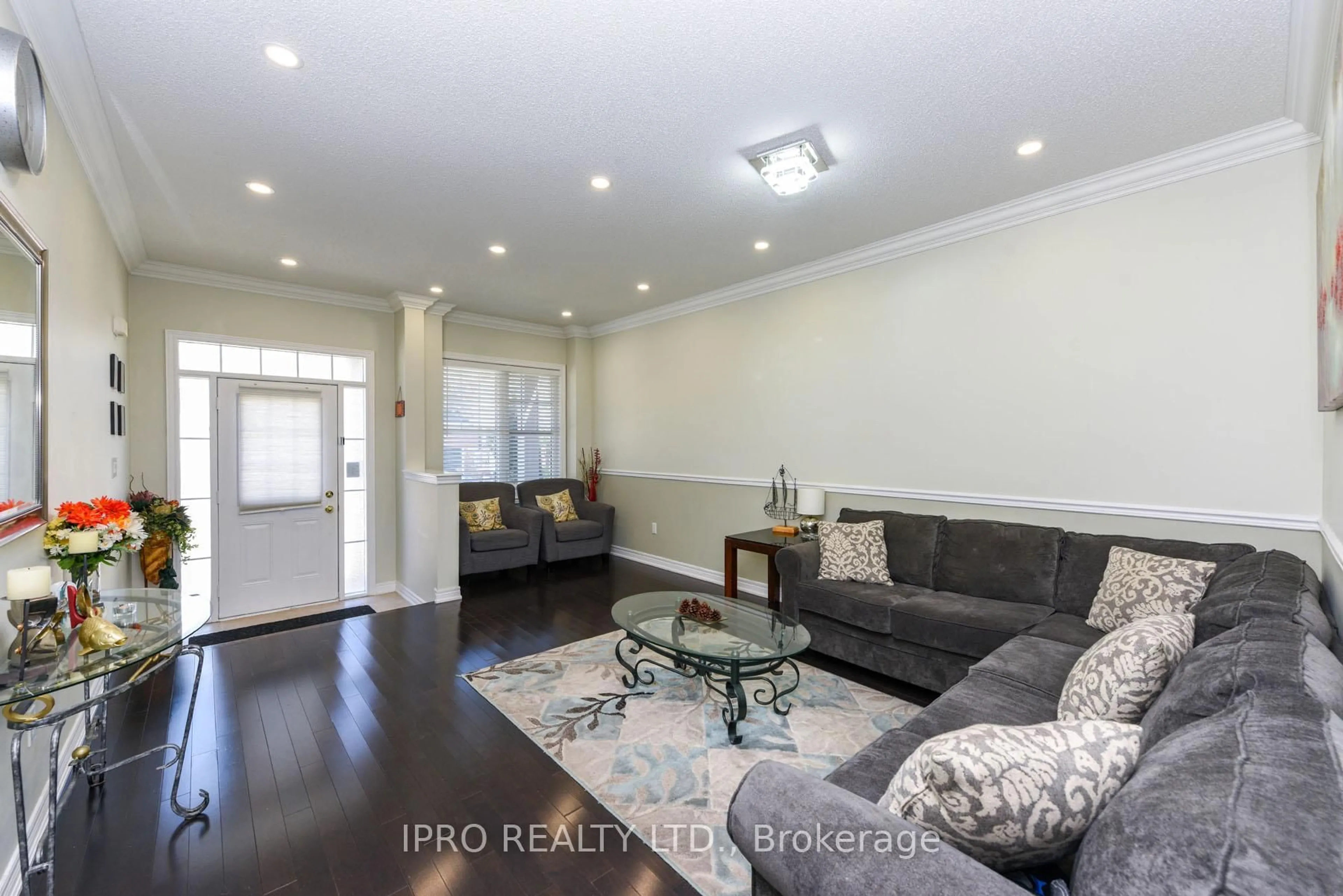 Living room with furniture, wood/laminate floor for 304 DALGLEISH Garden, Milton Ontario L9T 6Z7
