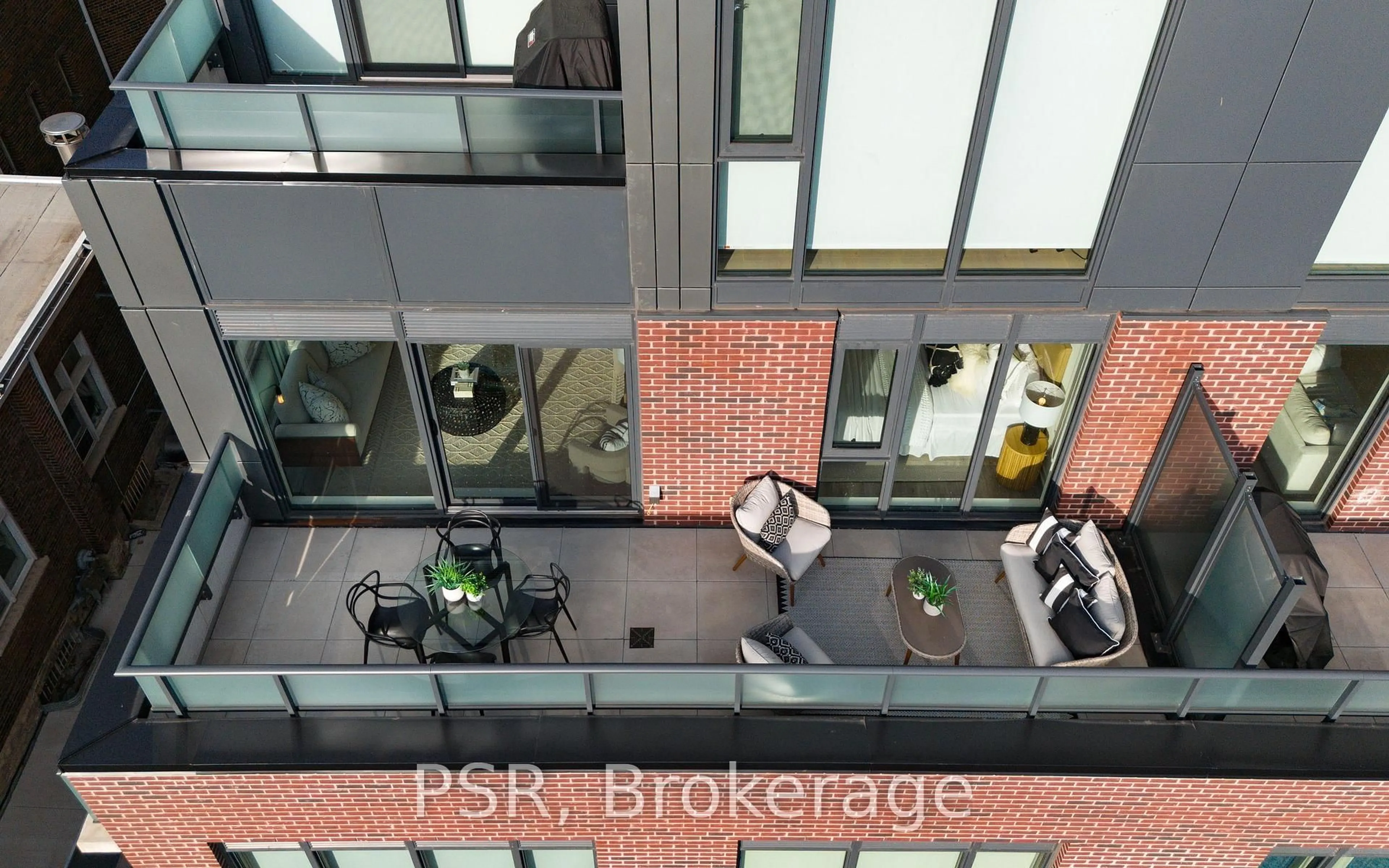 A pic from outside/outdoor area/front of a property/back of a property/a pic from drone, city buildings view from balcony for 430 Roncesvalles Ave #414, Toronto Ontario M6R 0A6