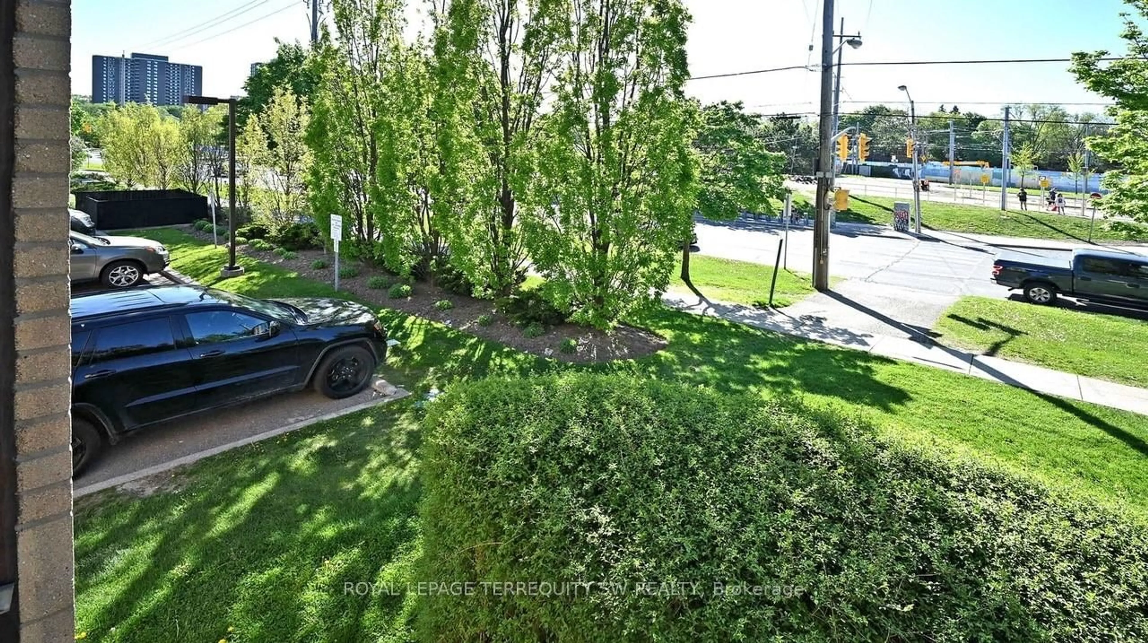A pic from outside/outdoor area/front of a property/back of a property/a pic from drone, street for 3835 Lake Shore Blvd #210, Toronto Ontario M8W 1R2