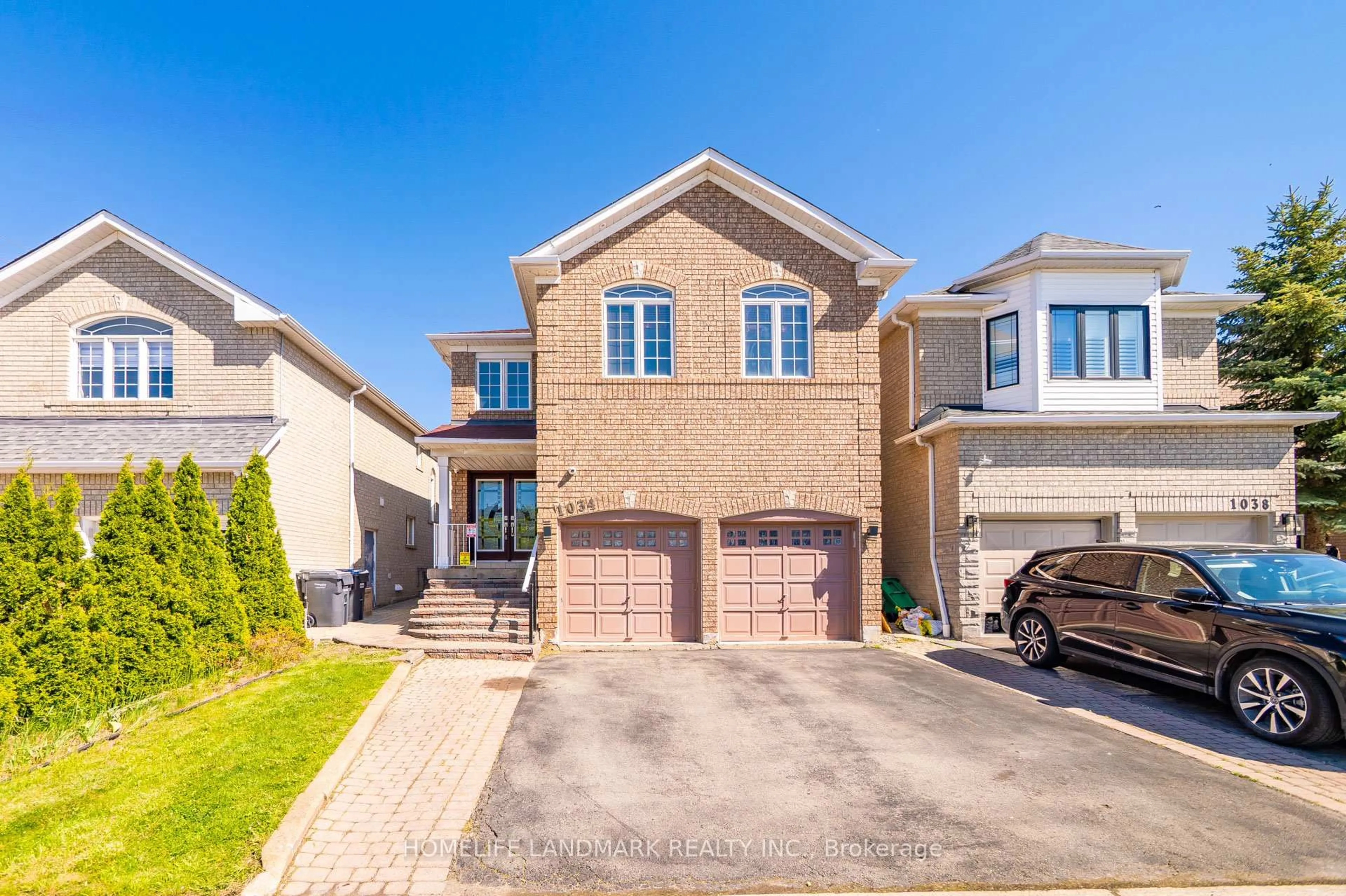 Home with brick exterior material, street for 1034 Blueheron Blvd, Mississauga Ontario L5V 2E1