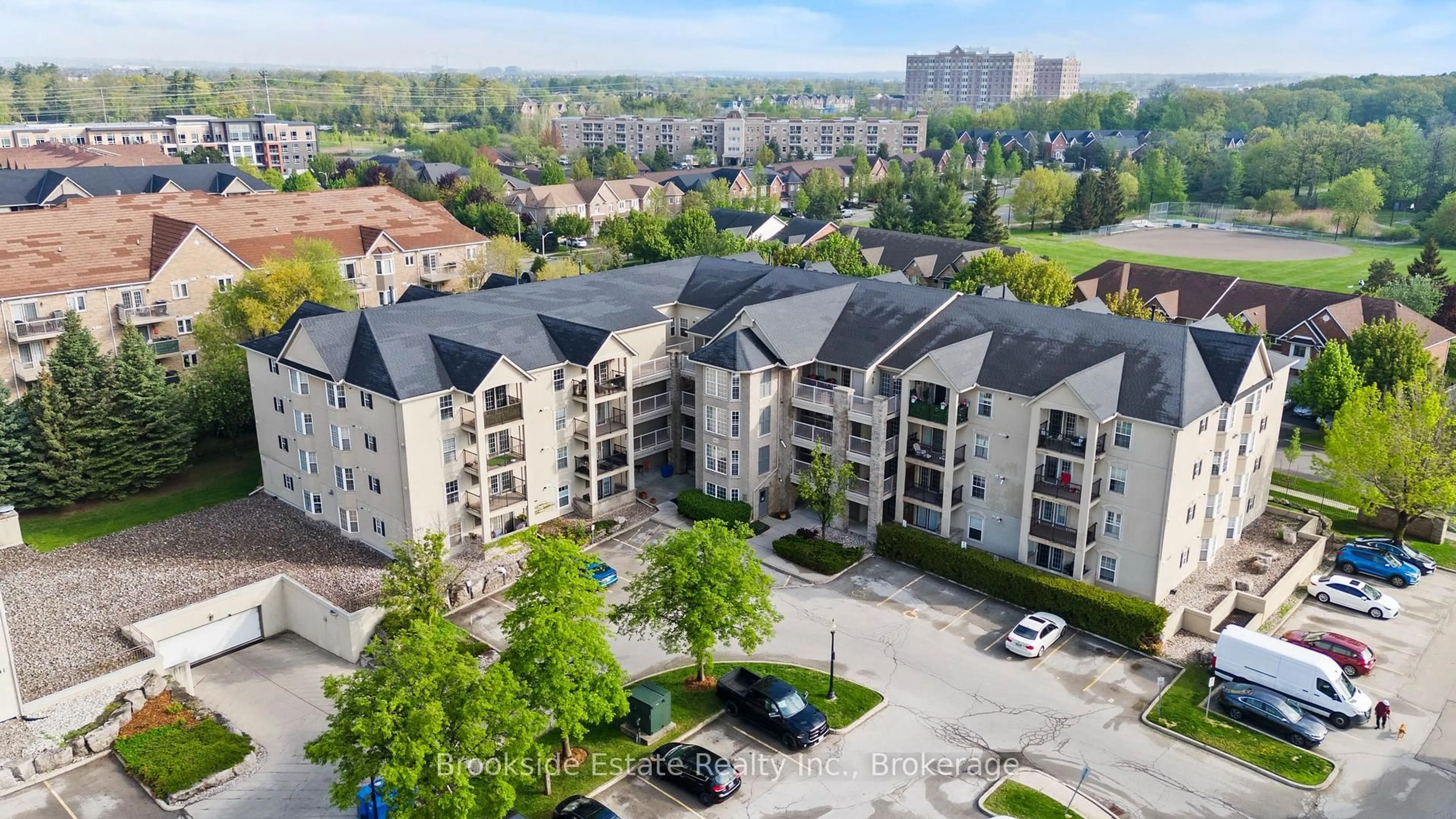 A pic from outside/outdoor area/front of a property/back of a property/a pic from drone, city buildings view from balcony for 1431 Walkers Line #103, Burlington Ontario L7M 4P3