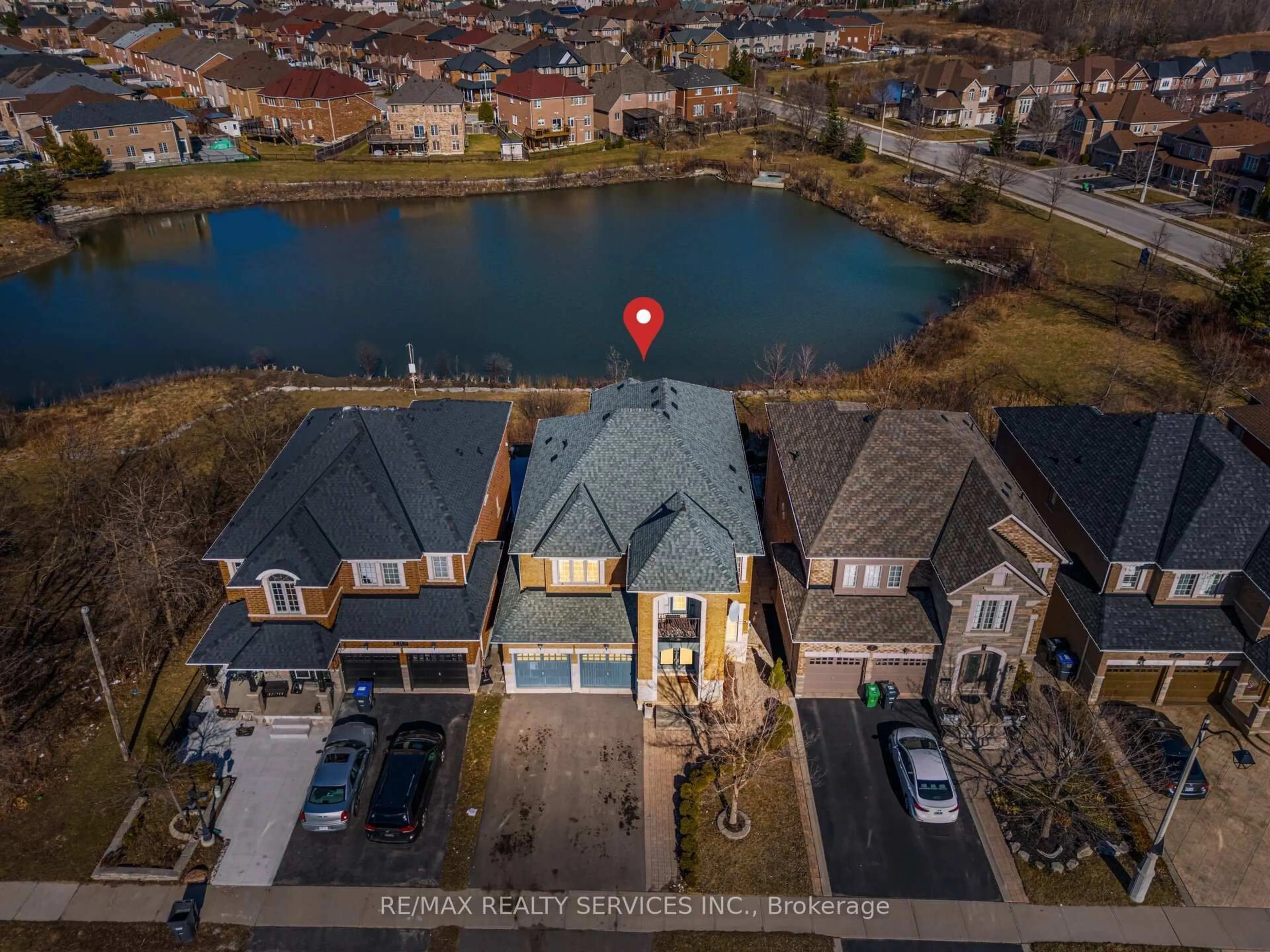 A pic from outside/outdoor area/front of a property/back of a property/a pic from drone, water/lake/river/ocean view for 9 Watchman Rd, Brampton Ontario L6P 2E9
