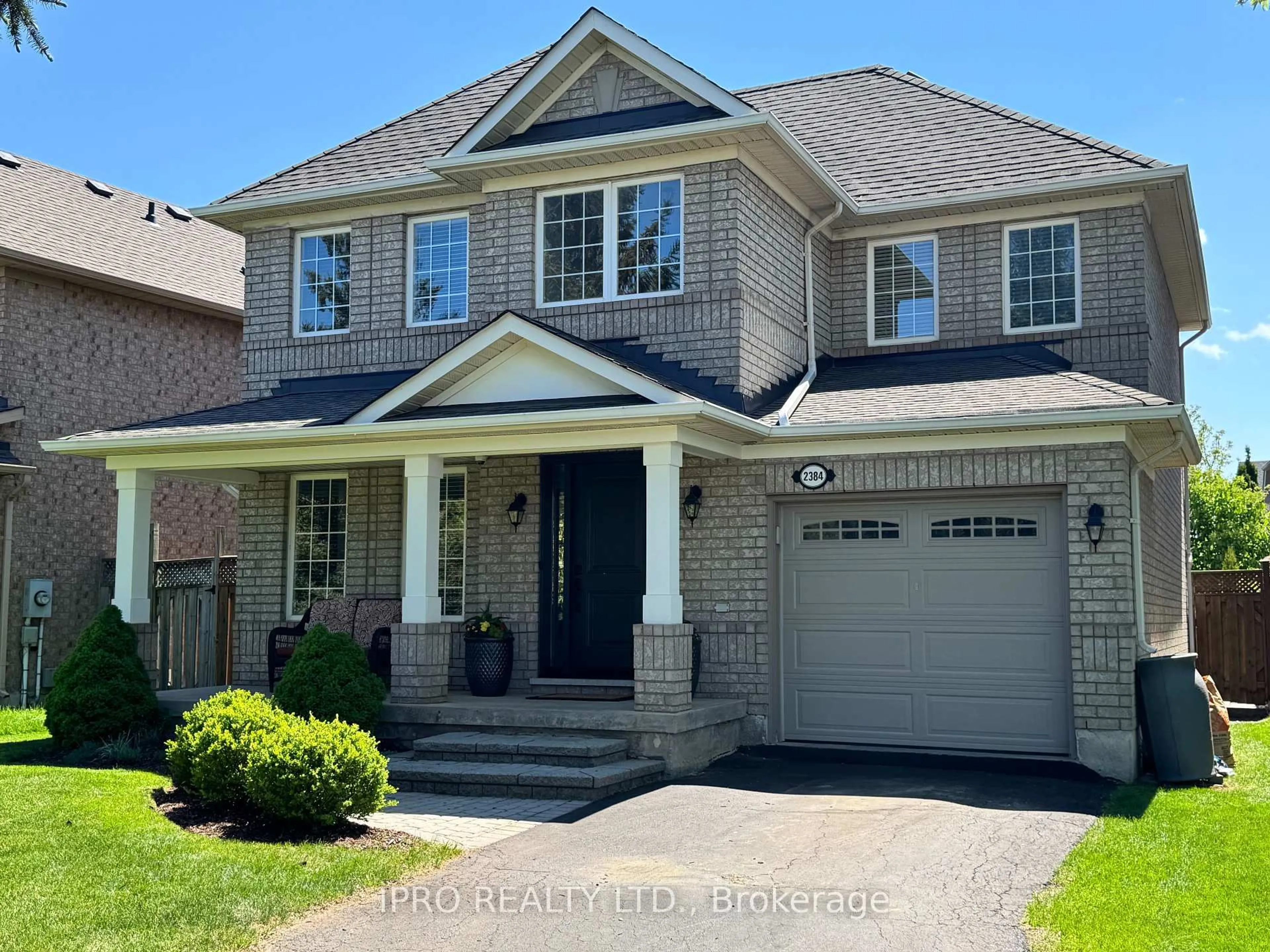 Home with brick exterior material, street for 2384 Proudfoot Tr, Oakville Ontario L6M 3Y1
