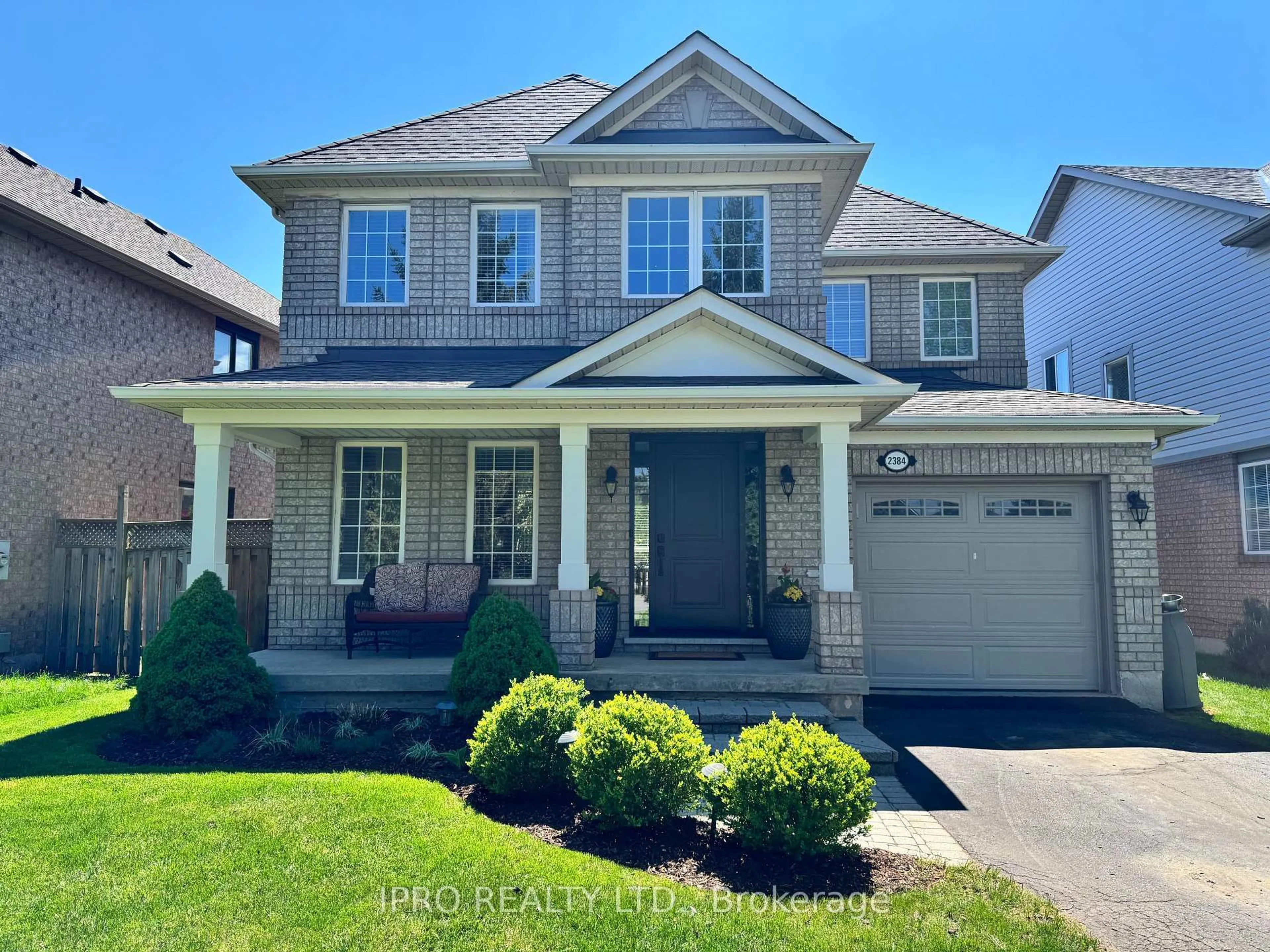 Home with brick exterior material, street for 2384 Proudfoot Tr, Oakville Ontario L6M 3Y1