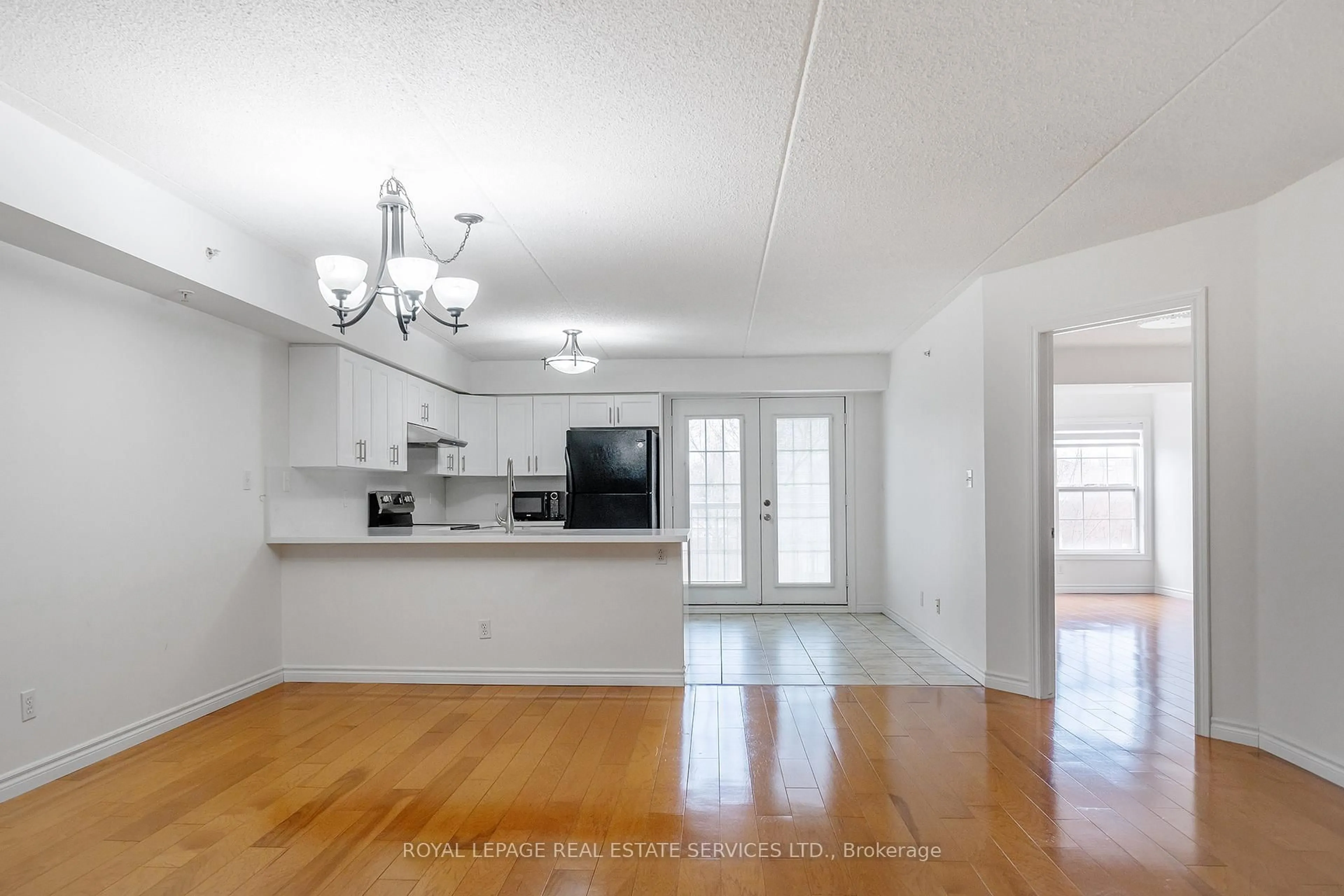 Open concept kitchen, unknown for 1460 Bishops Gate #212, Oakville Ontario L6M 4N5