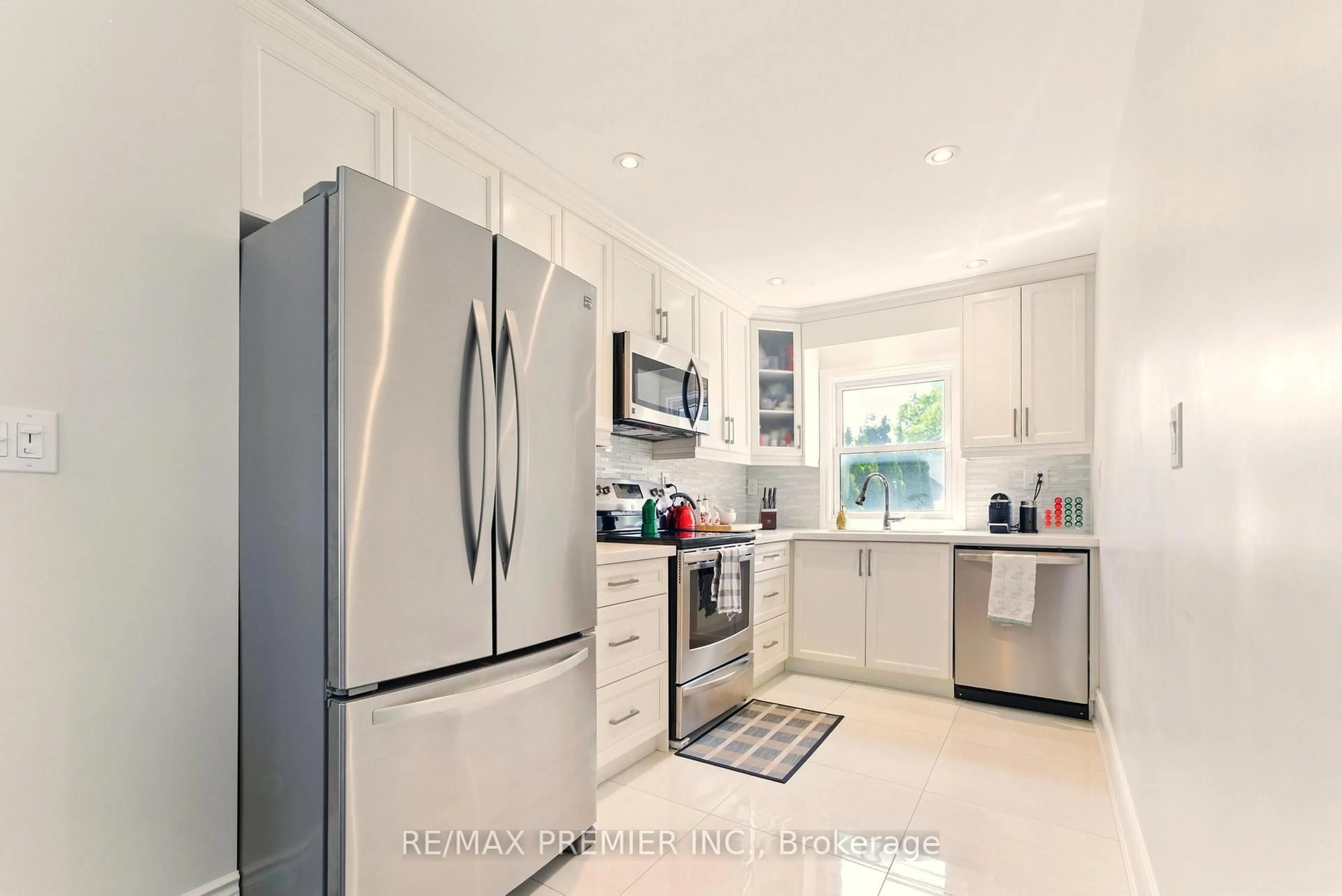 Open concept kitchen, ceramic/tile floor for 69 Stewart Smith Dr, Toronto Ontario M6M 2T1