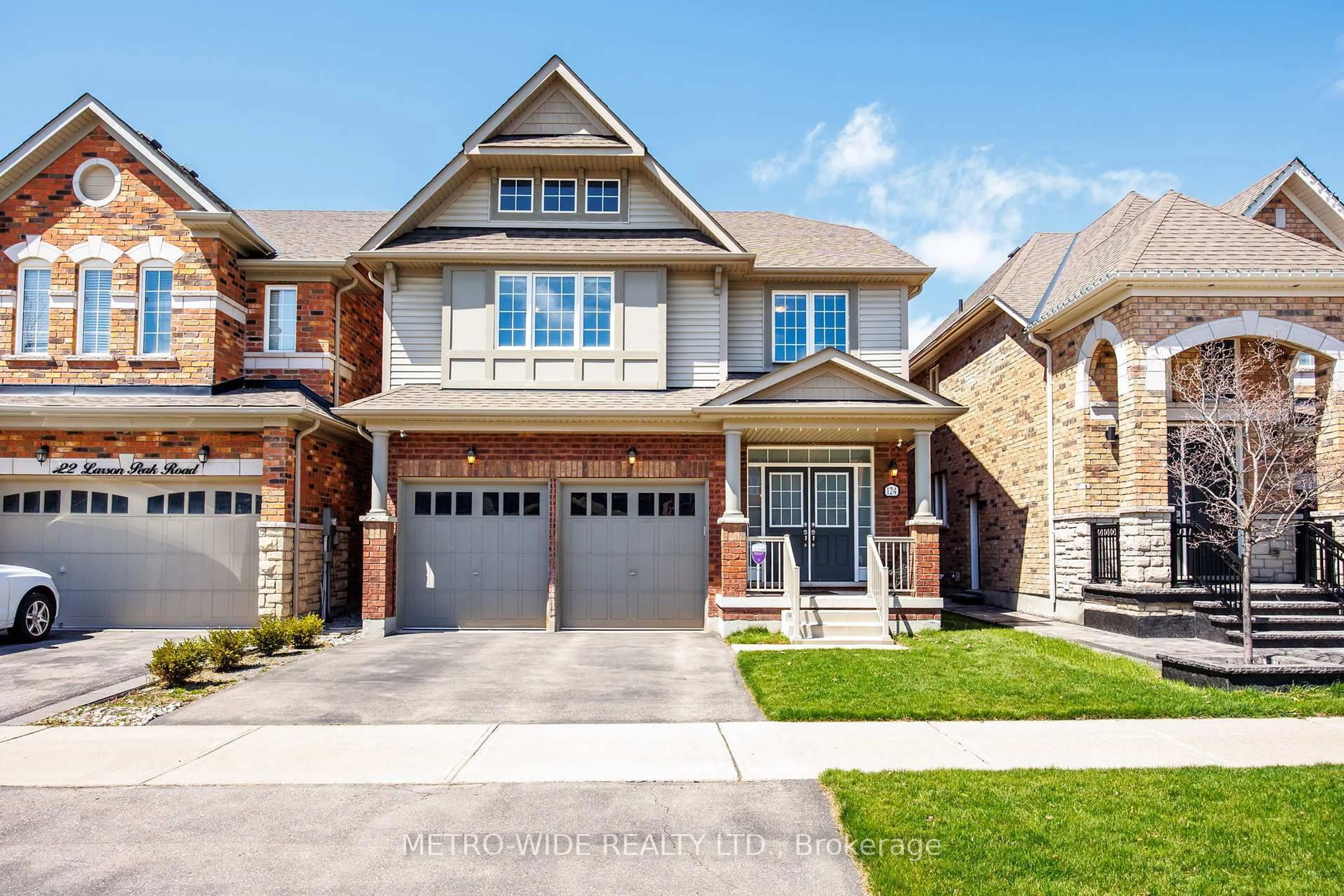 Home with brick exterior material, street for 124 Larson Peak Rd, Caledon Ontario L7C 4B3