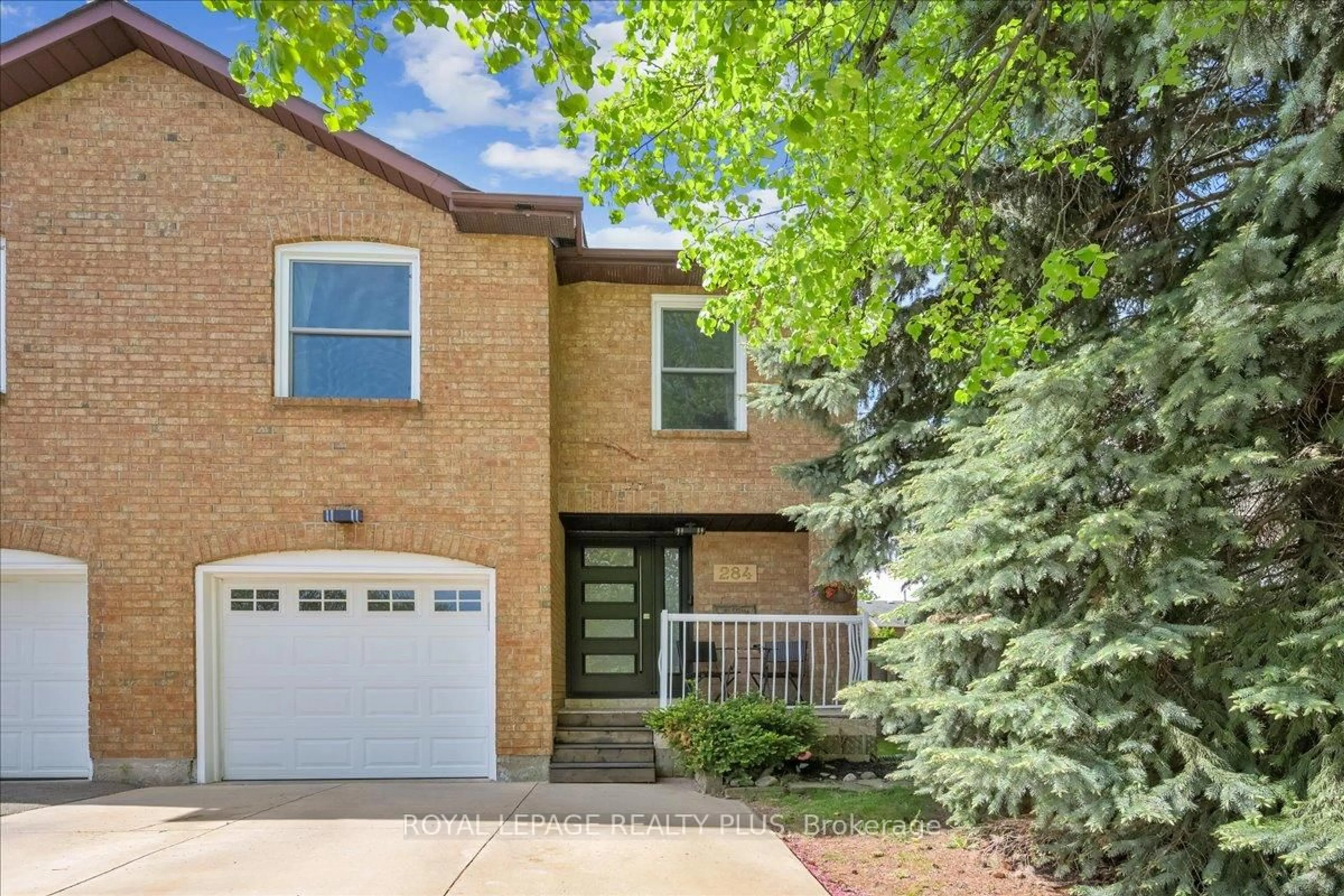 Home with brick exterior material, street for 284 Rimmington Dr, Oakville Ontario L6H 3N5