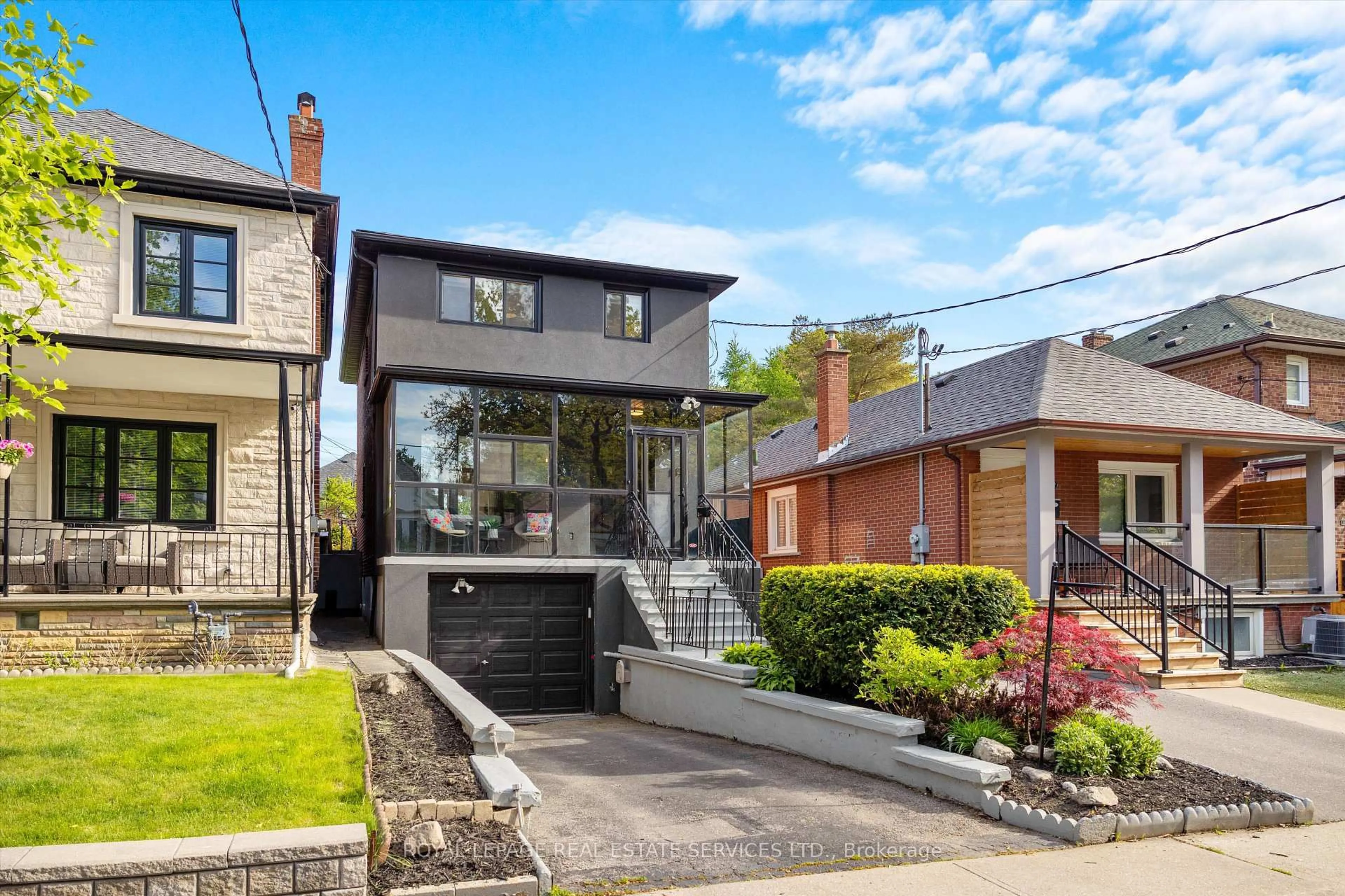 Home with brick exterior material, street for 137 Belgravia Ave, Toronto Ontario M6E 2M6