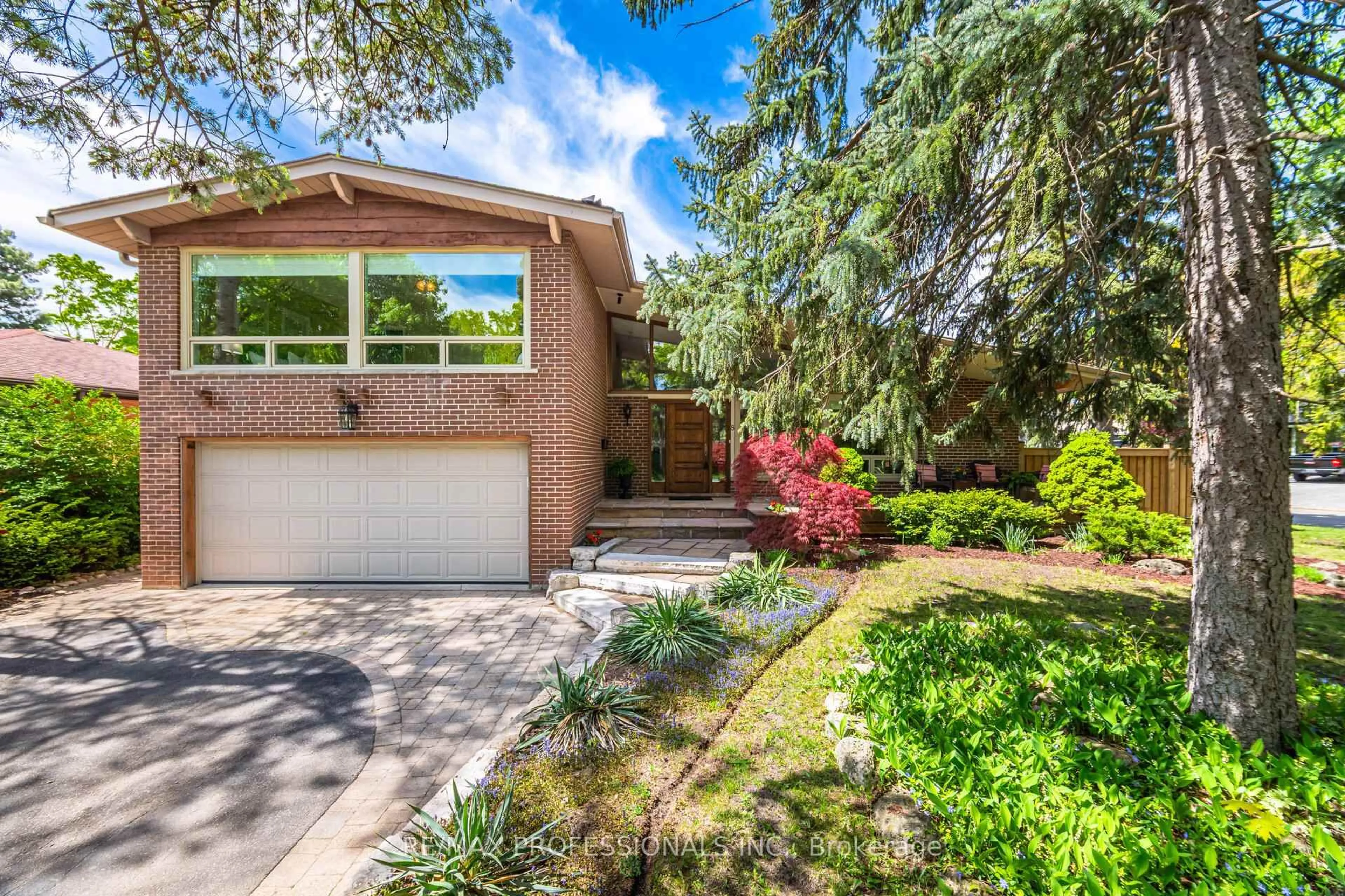Home with brick exterior material, street for 8 Silverthorne Bush Dr, Toronto Ontario M9C 2X5