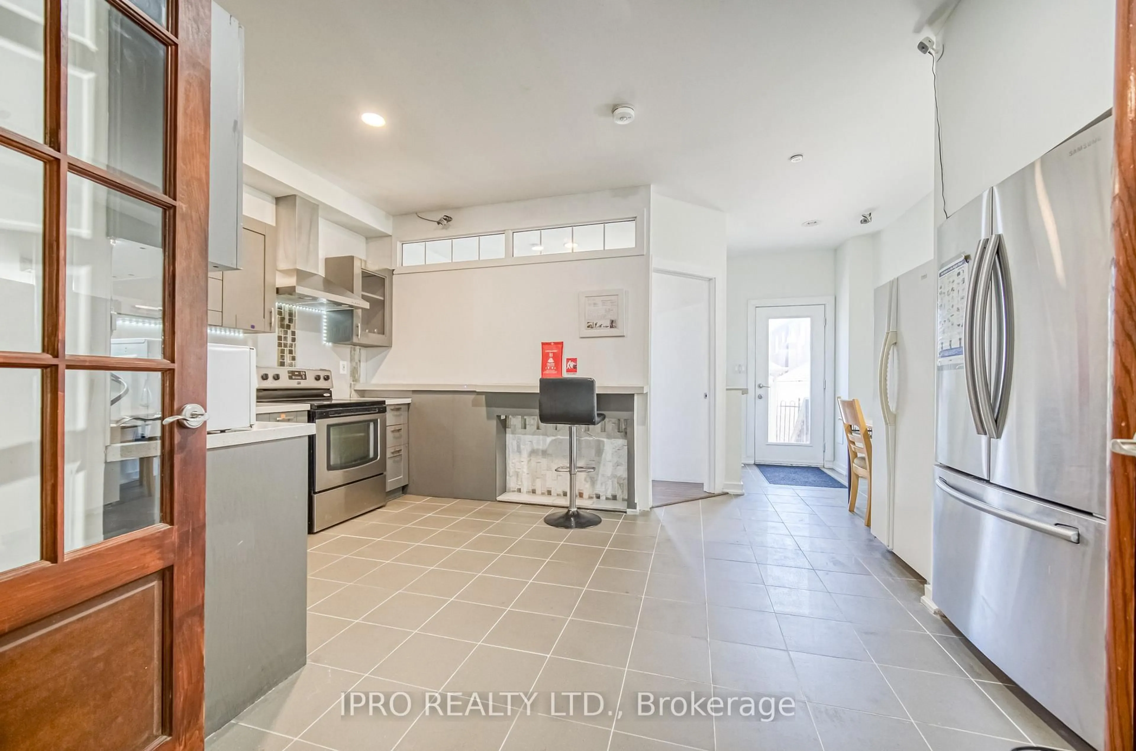 Open concept kitchen, ceramic/tile floor for 239 Assiniboine Rd, Toronto Ontario M3J 0E3
