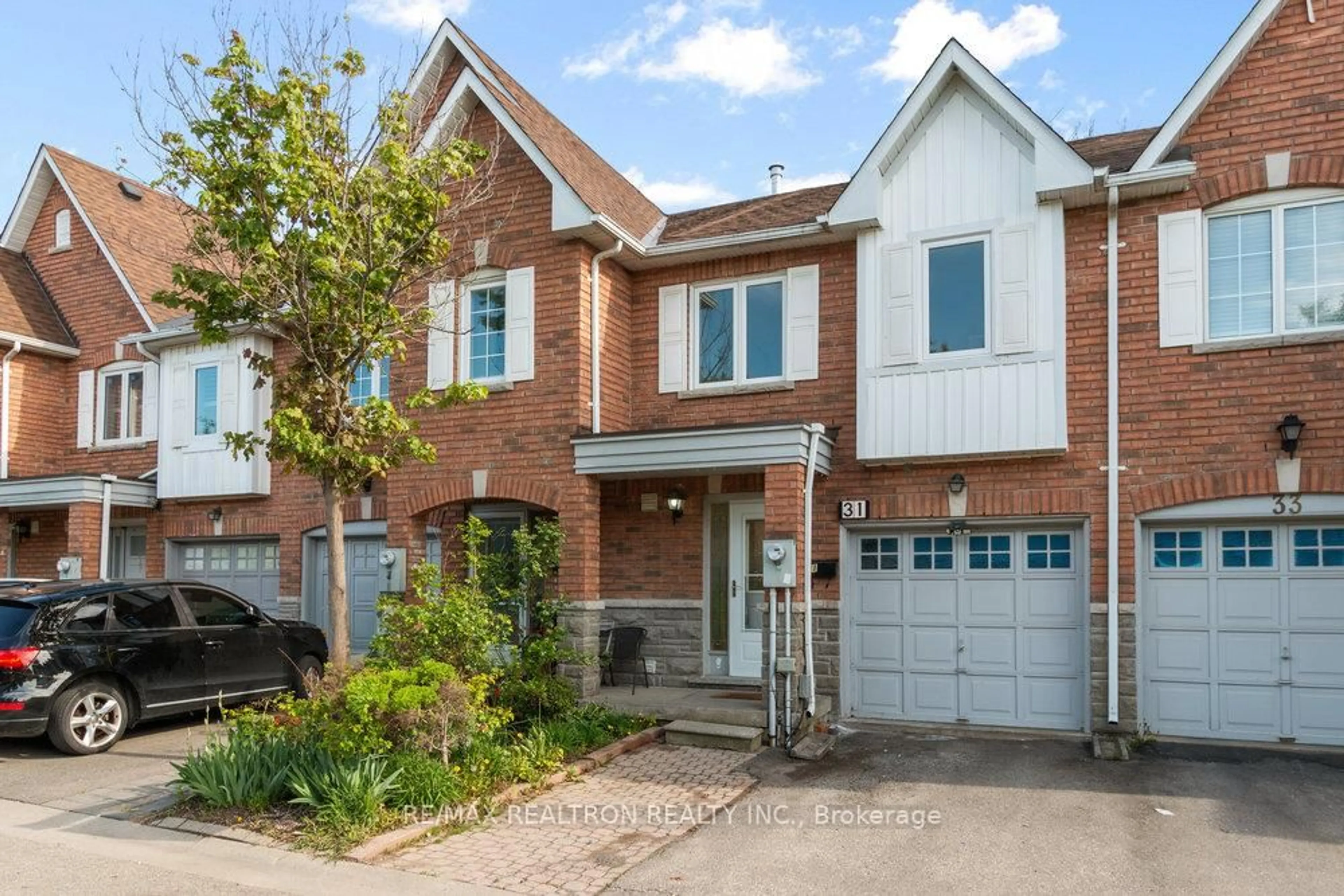 Home with brick exterior material, street for 31 Treeland Way #16, Toronto Ontario M3M 3H7