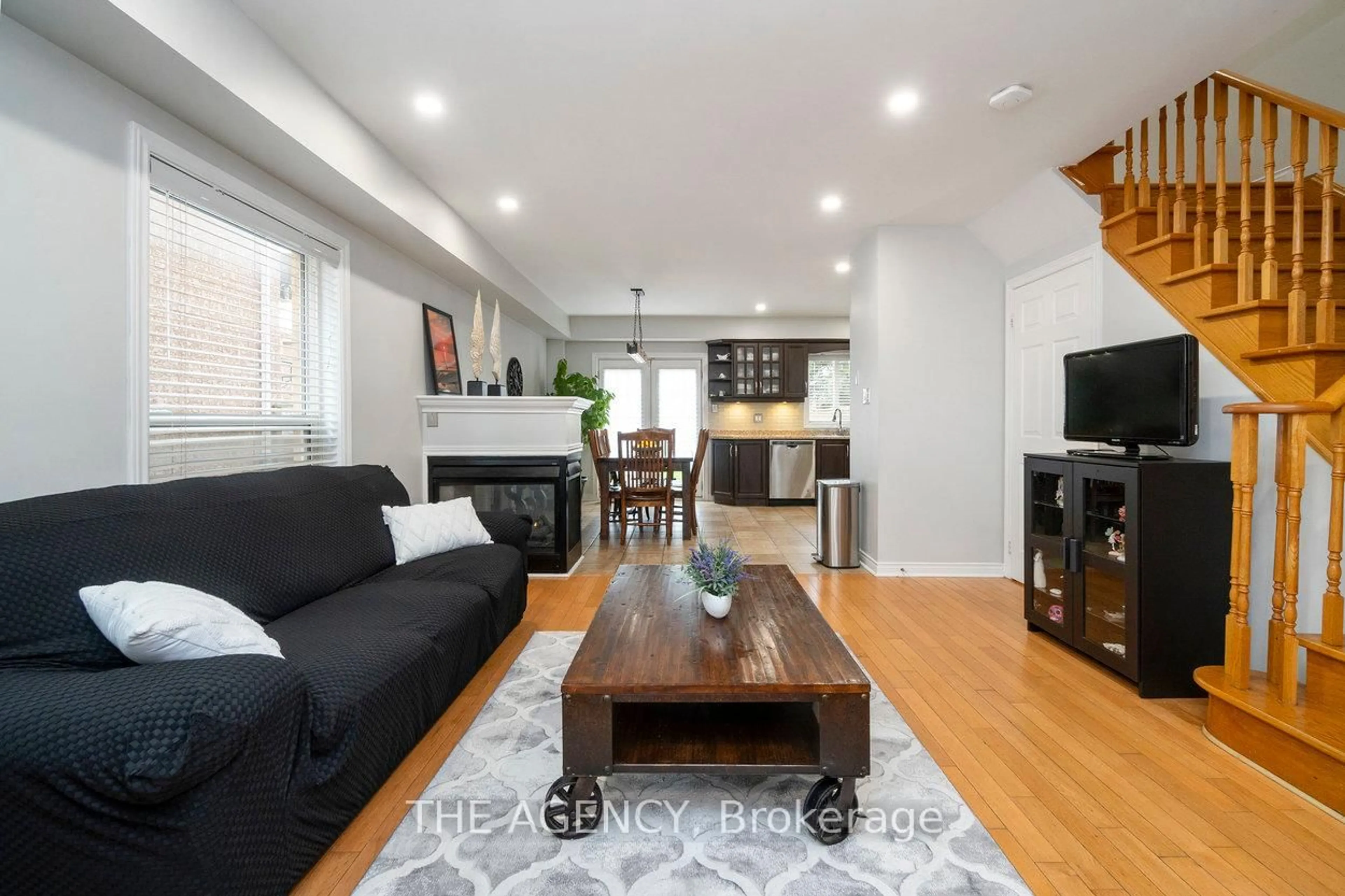 Living room with furniture, wood/laminate floor for 20 Highmore Ave, Caledon Ontario L7E 1V7