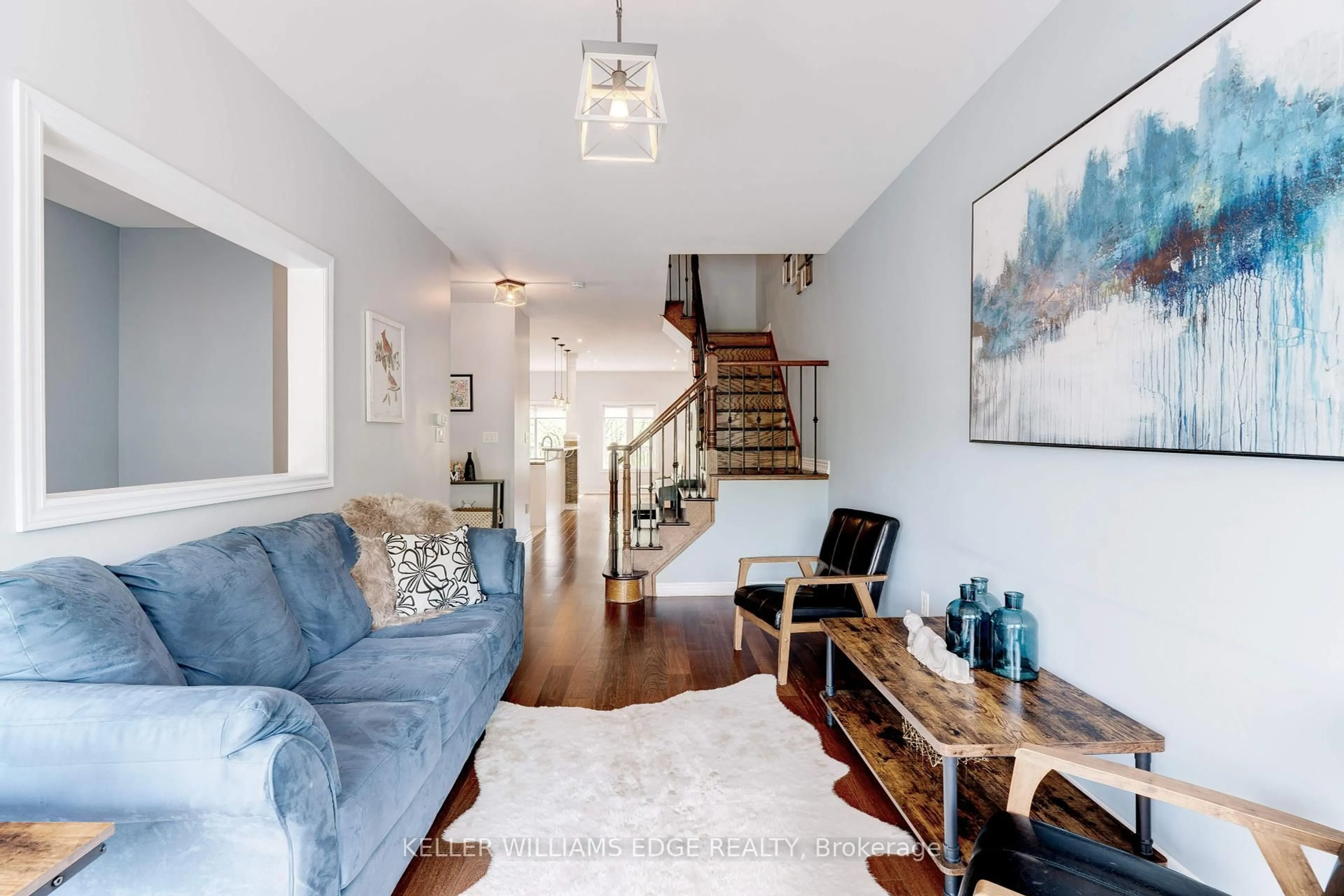 Living room with furniture, wood/laminate floor for 230 Paisley Blvd #5, Mississauga Ontario L5B 0C5