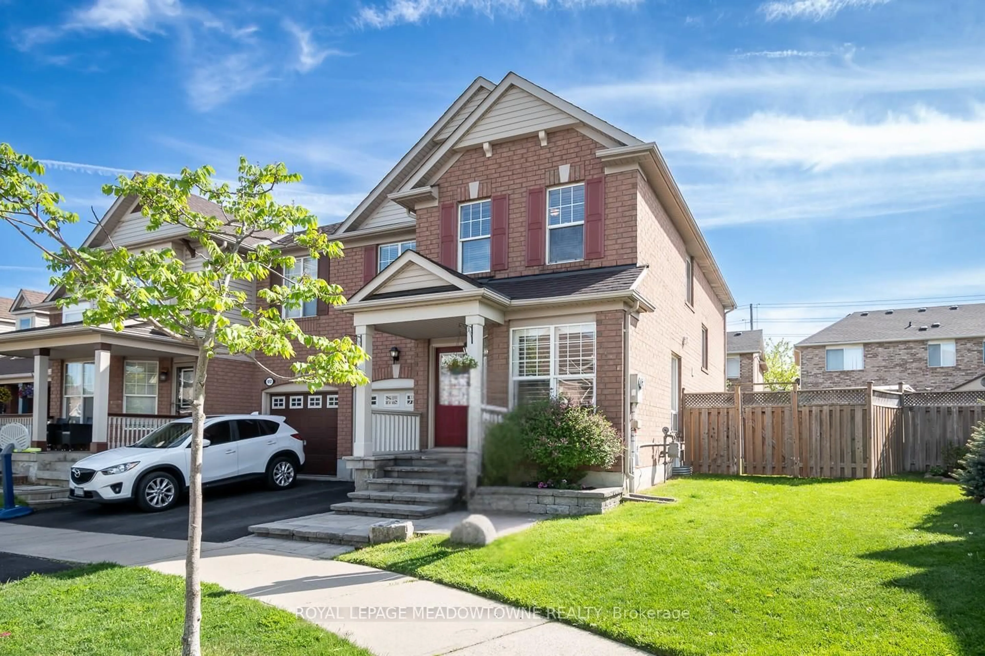 Home with brick exterior material, street for 1014 Cooper Ave, Milton Ontario L9T 5W7