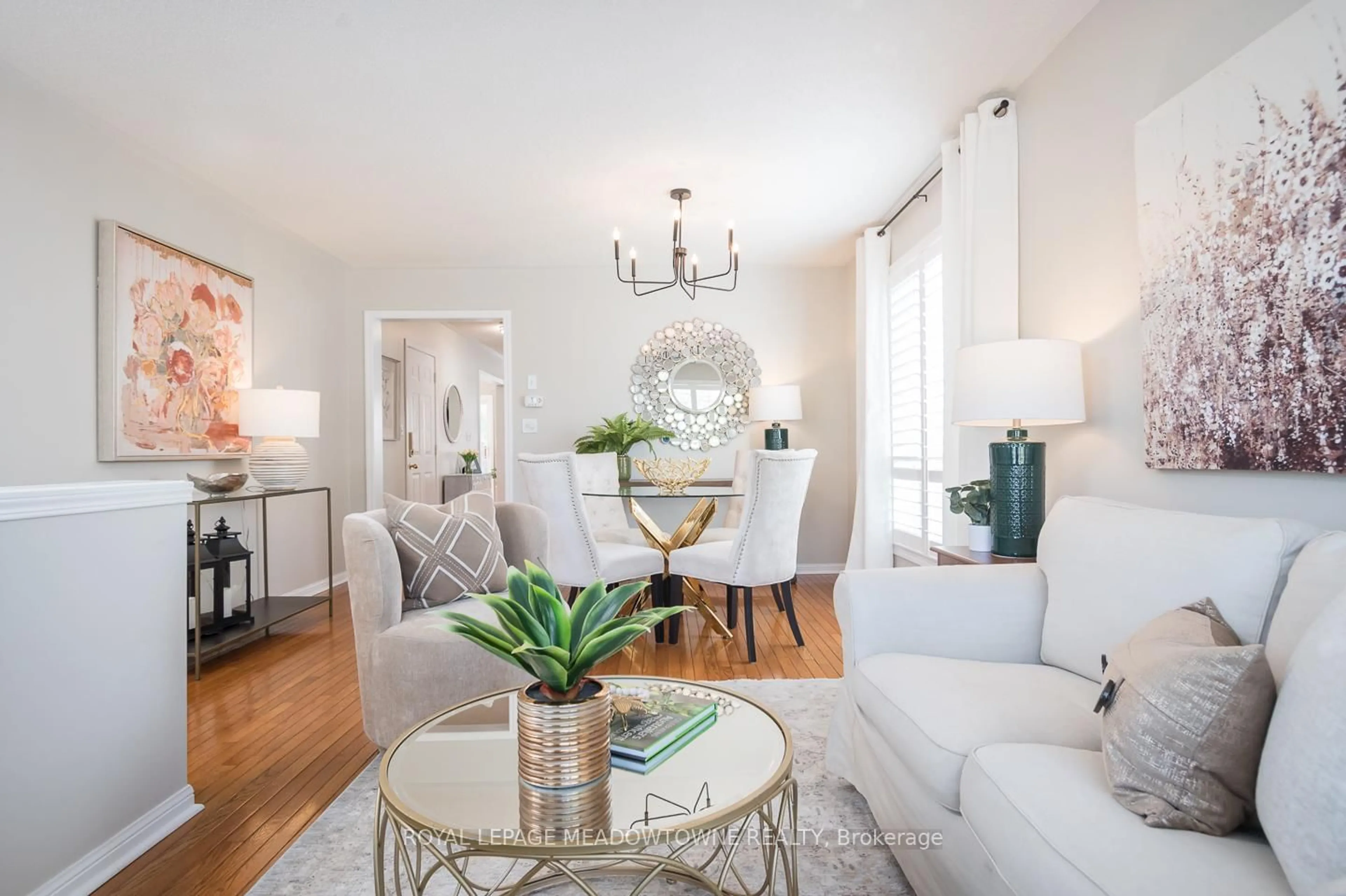 Living room with furniture, wood/laminate floor for 1014 Cooper Ave, Milton Ontario L9T 5W7