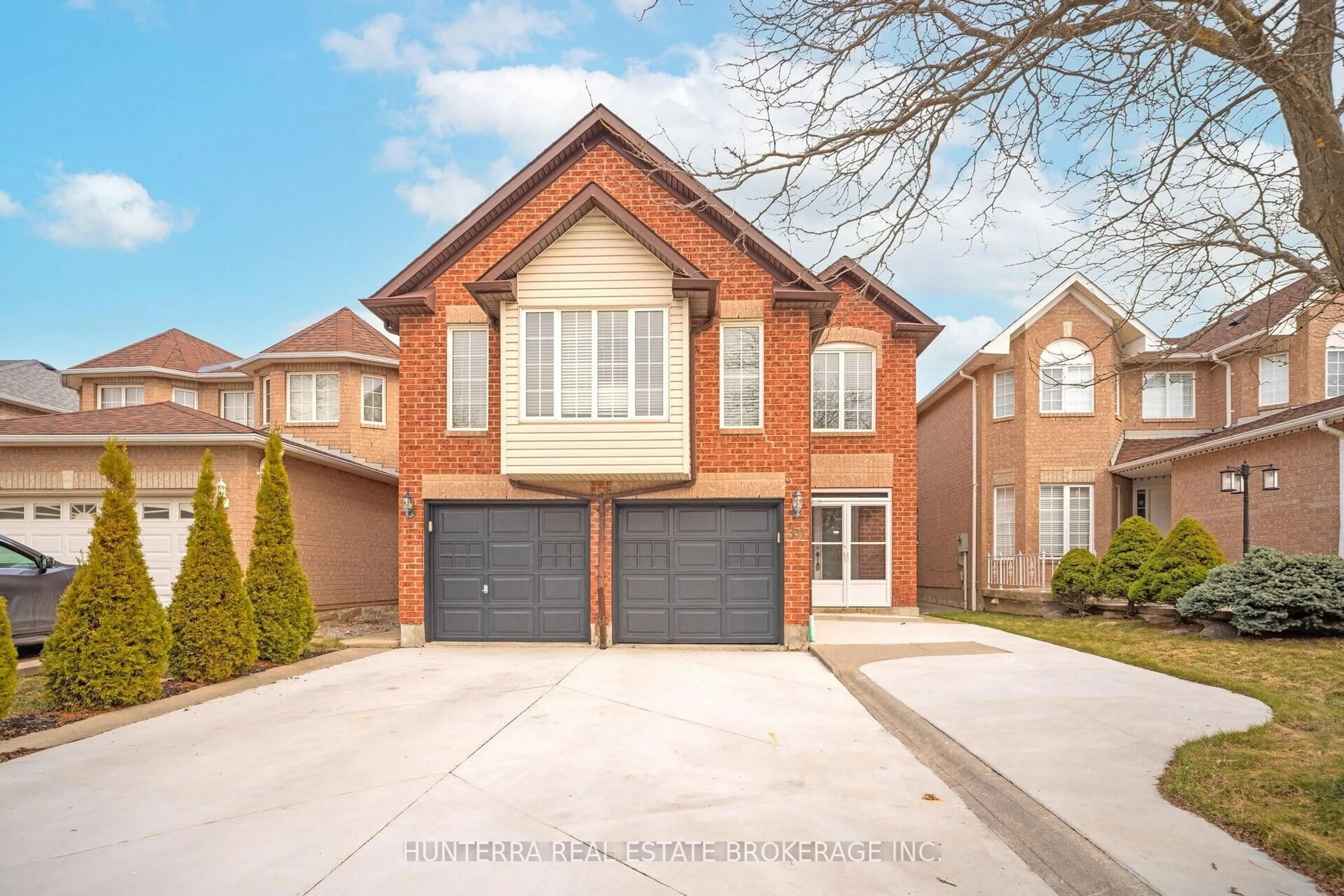 Home with brick exterior material, street for 38 Pebblestone Circ, Brampton Ontario L6X 4N2