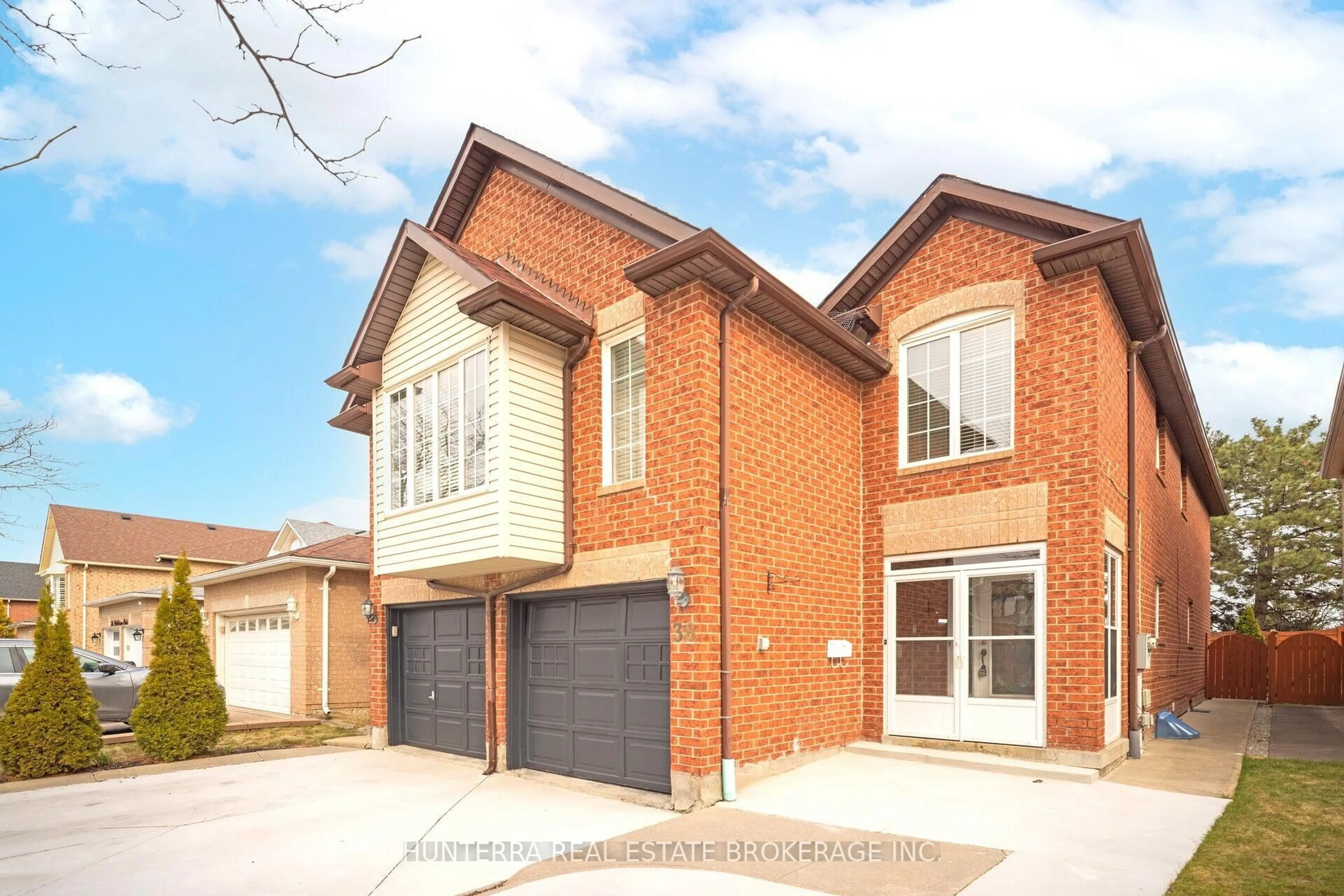 Home with brick exterior material, street for 38 Pebblestone Circ, Brampton Ontario L6X 4N2