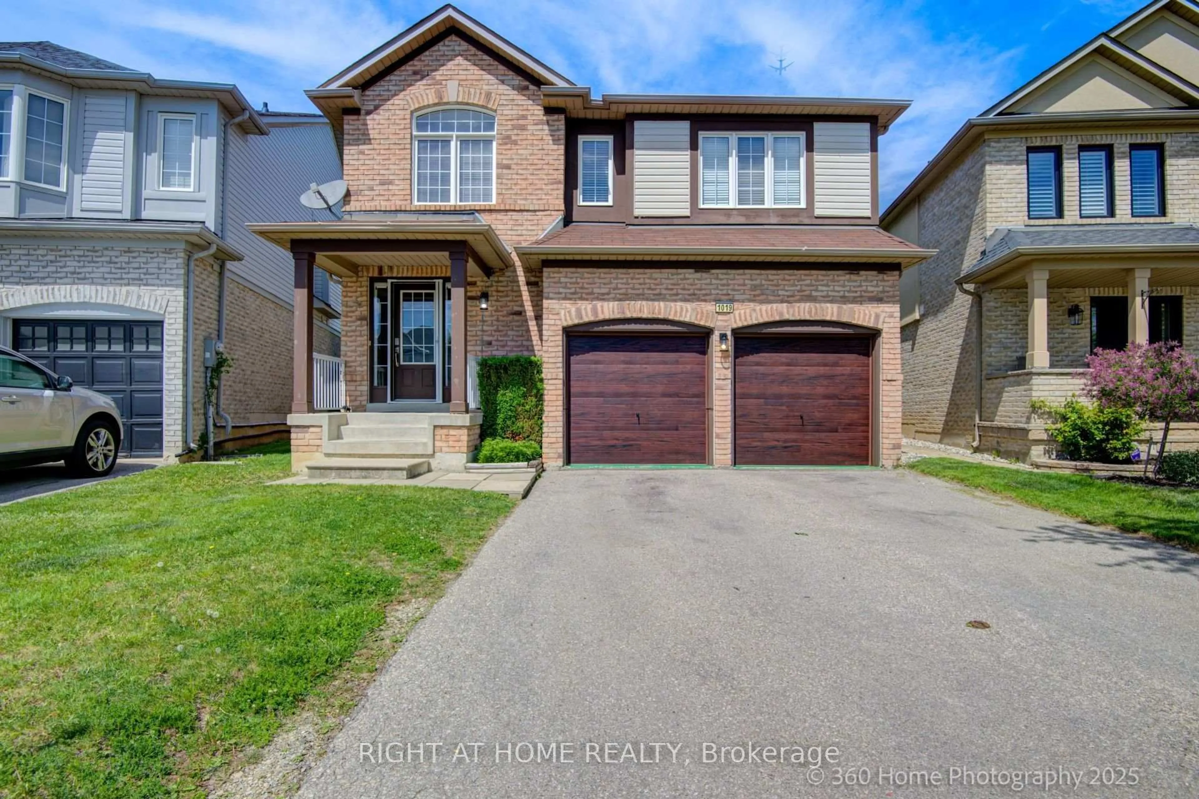Home with brick exterior material, street for 1019 Zimmerman Cres, Milton Ontario L9T 5S6