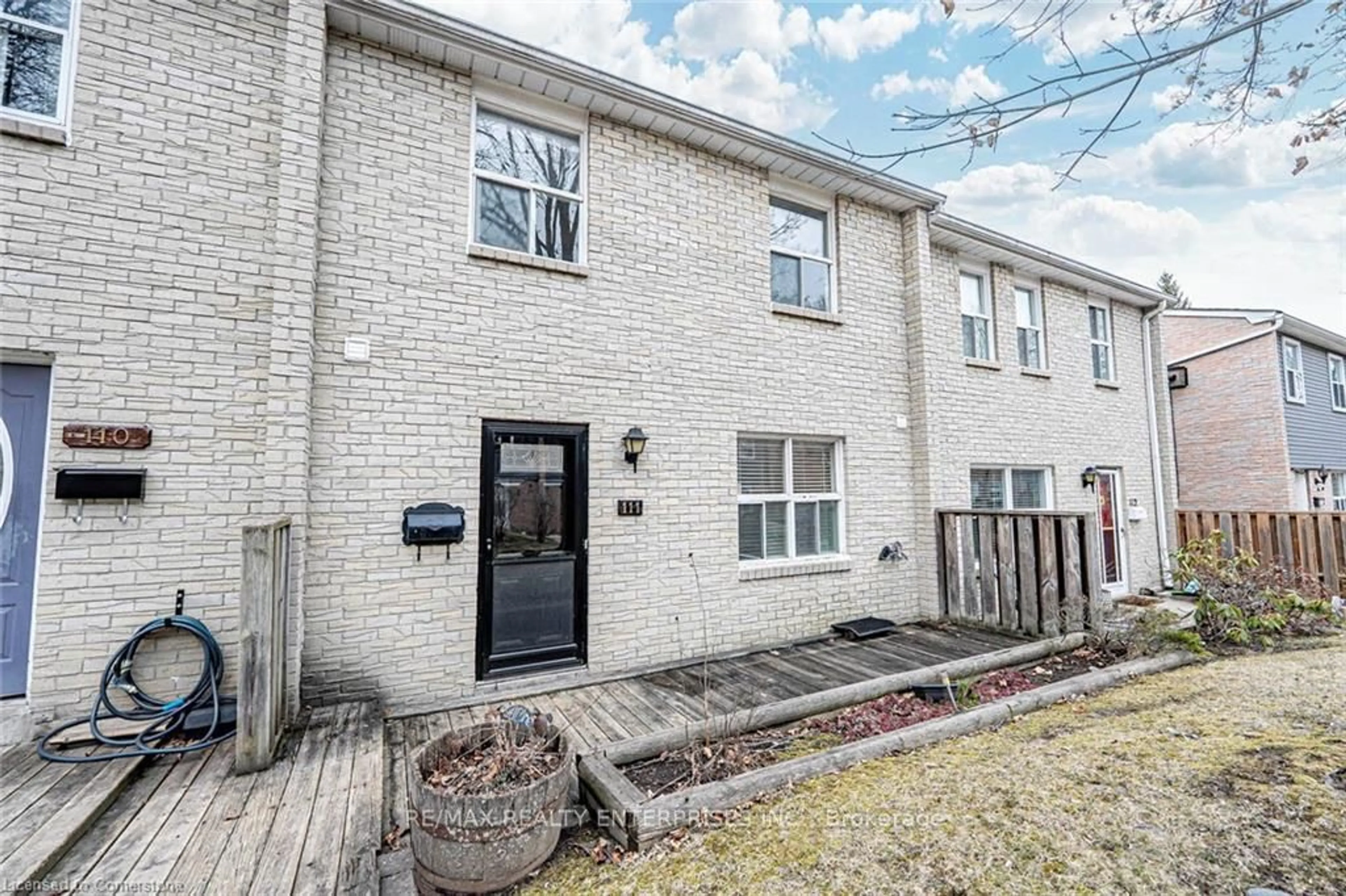 Home with brick exterior material, street for 1050 Shawnmarr Rd #111, Mississauga Ontario L5H 3V1