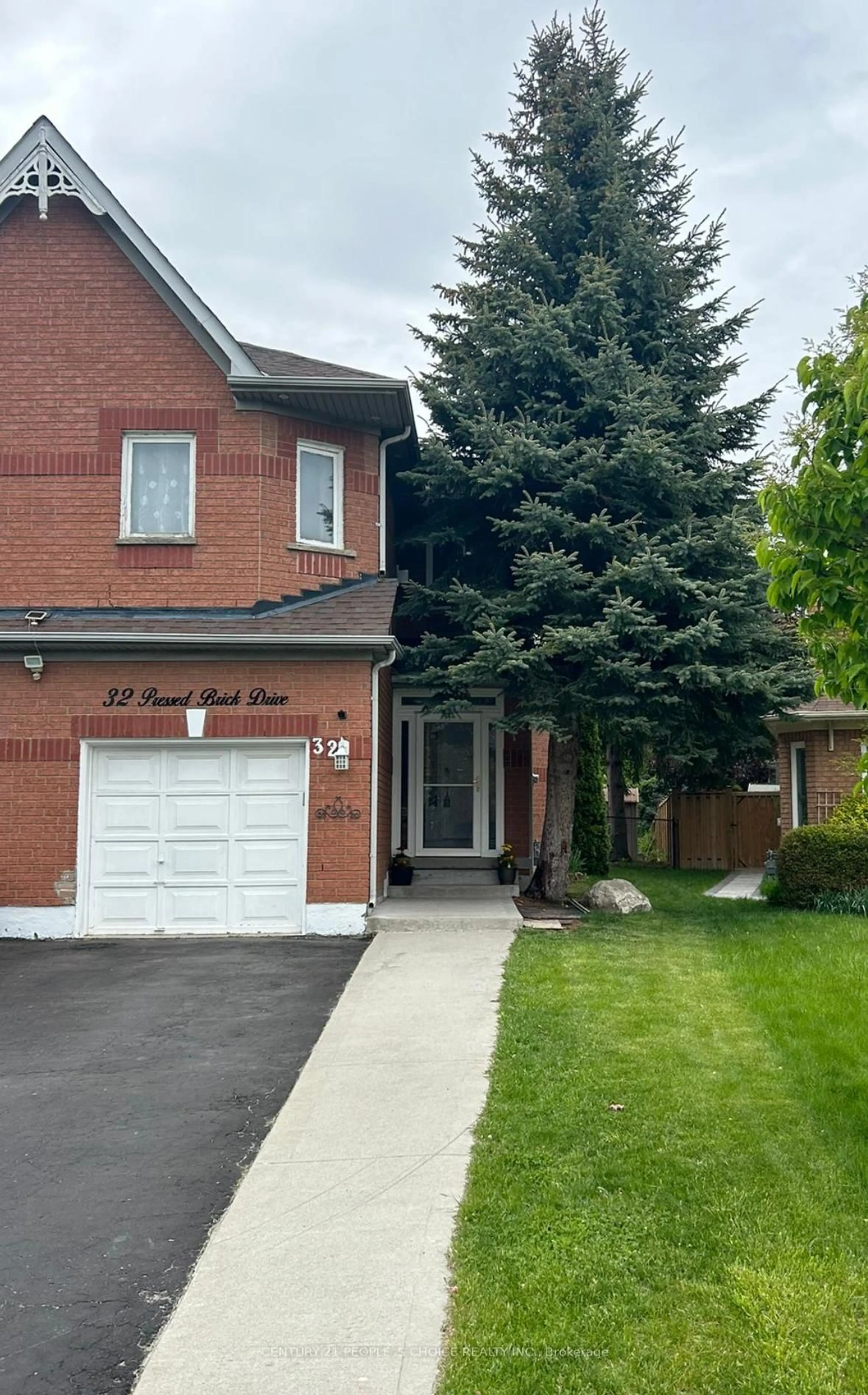 Home with brick exterior material, street for 32 Pressed Brick Dr, Brampton Ontario L6V 4K3