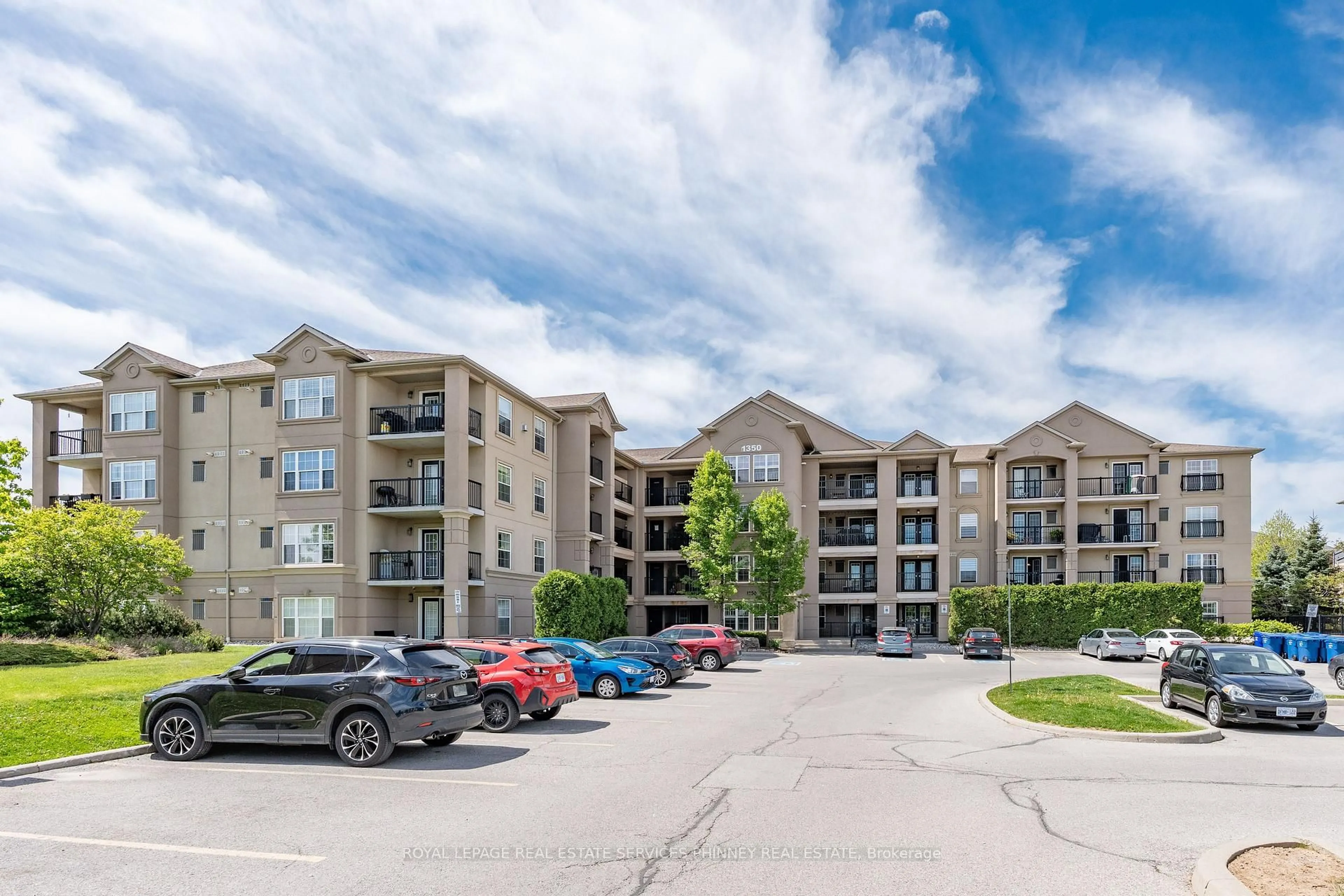 A pic from outside/outdoor area/front of a property/back of a property/a pic from drone, unknown for 1350 Main St #208, Milton Ontario L9T 7S7