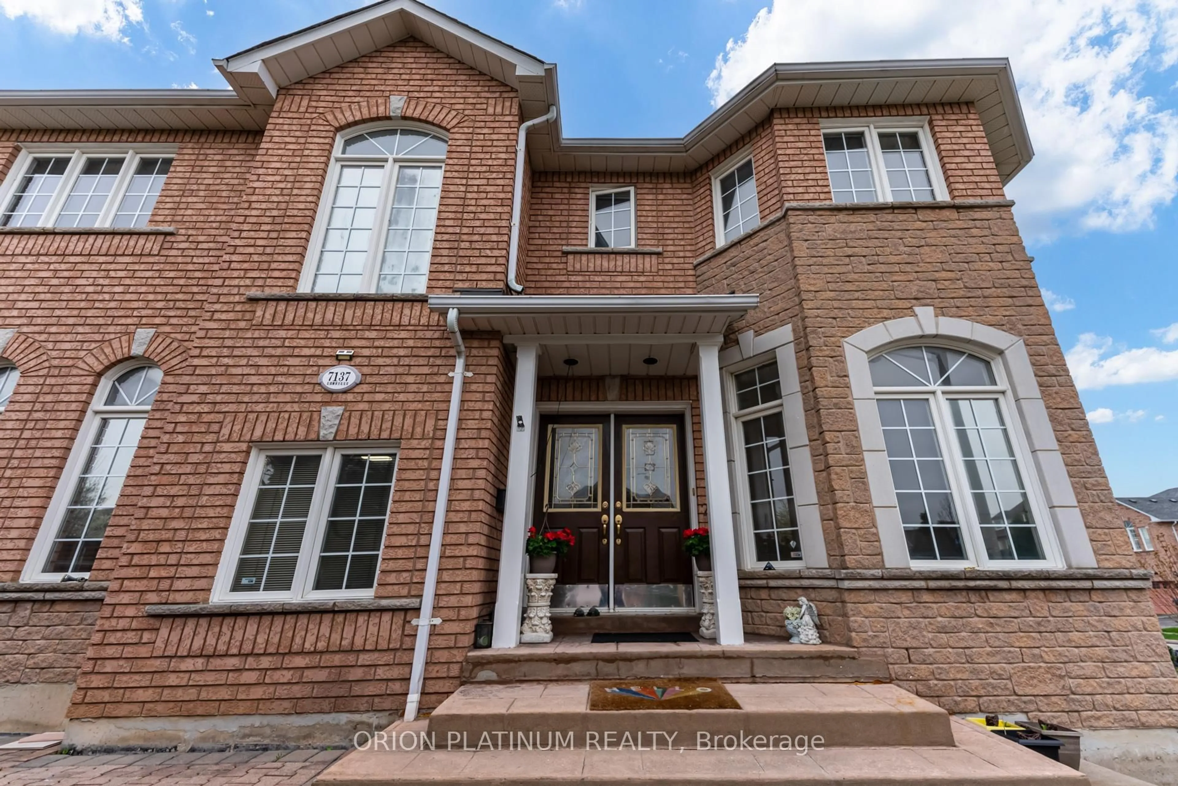 Home with brick exterior material, street for 7137 Lowville Hts, Mississauga Ontario L5N 8E7
