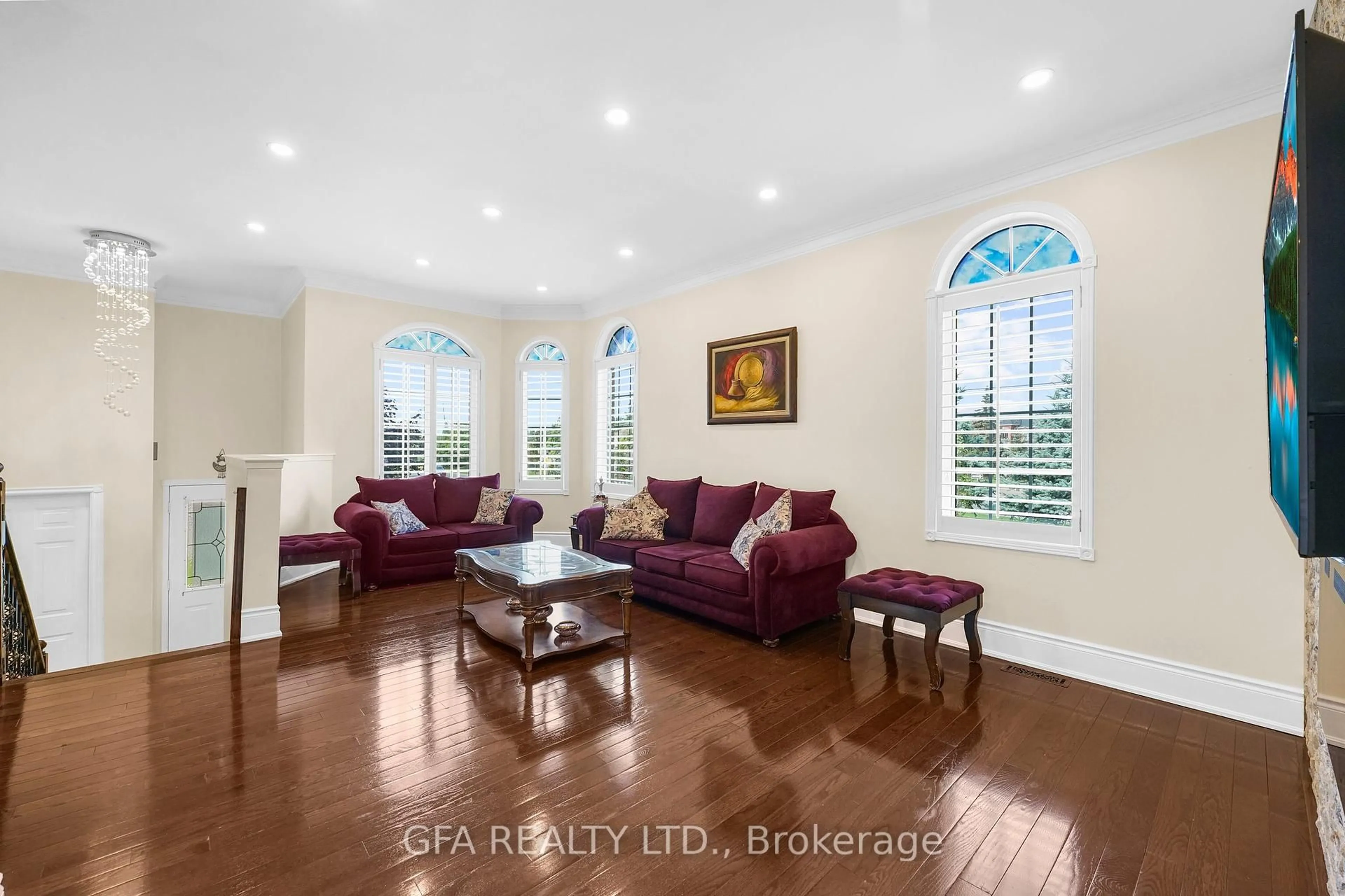 Living room with furniture, ceramic/tile floor for 7349 Zinnia Pl, Mississauga Ontario L5W 1K6