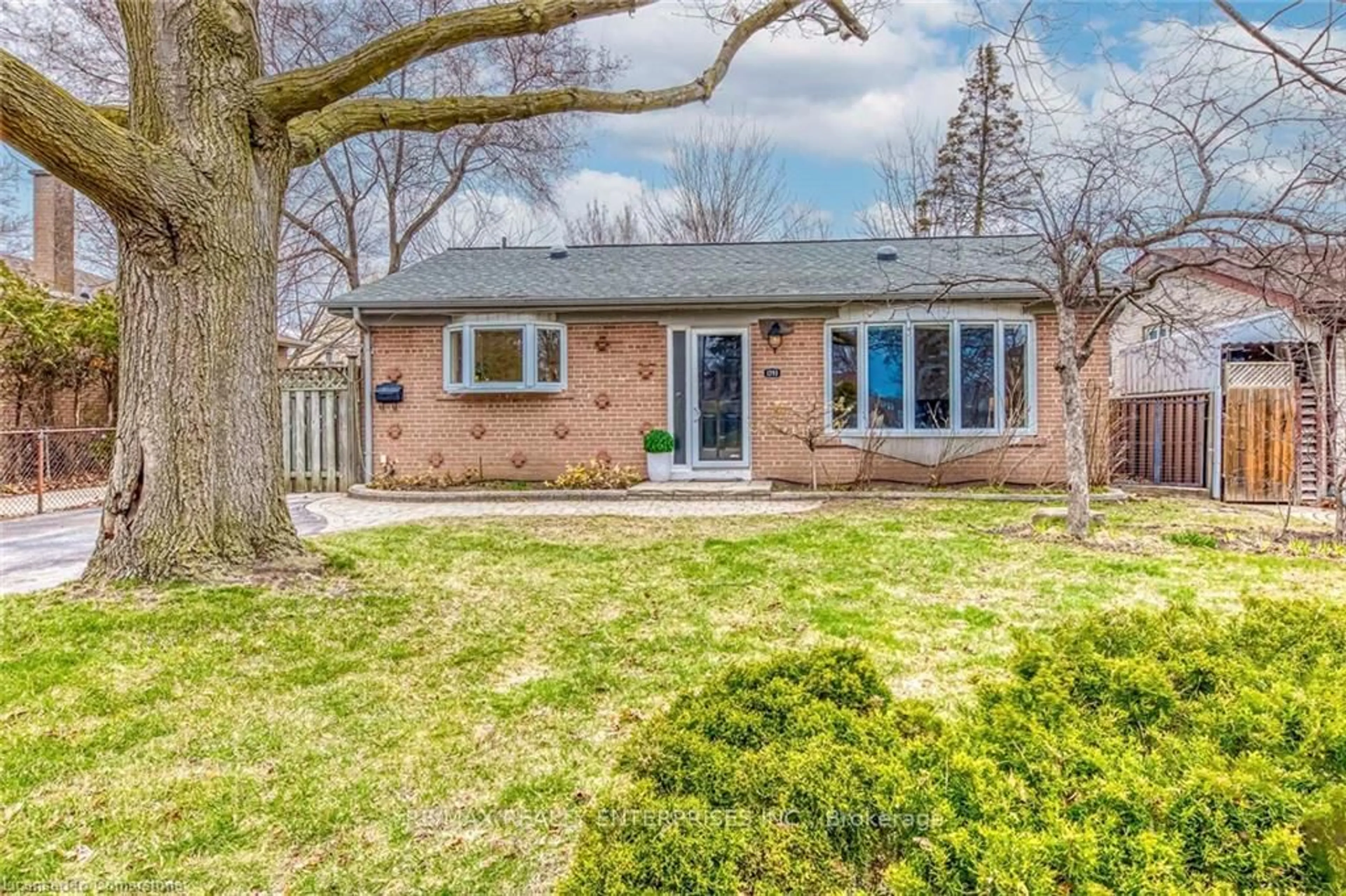 Home with brick exterior material, street for 1293 Lewisham Dr, Mississauga Ontario L5J 3P8