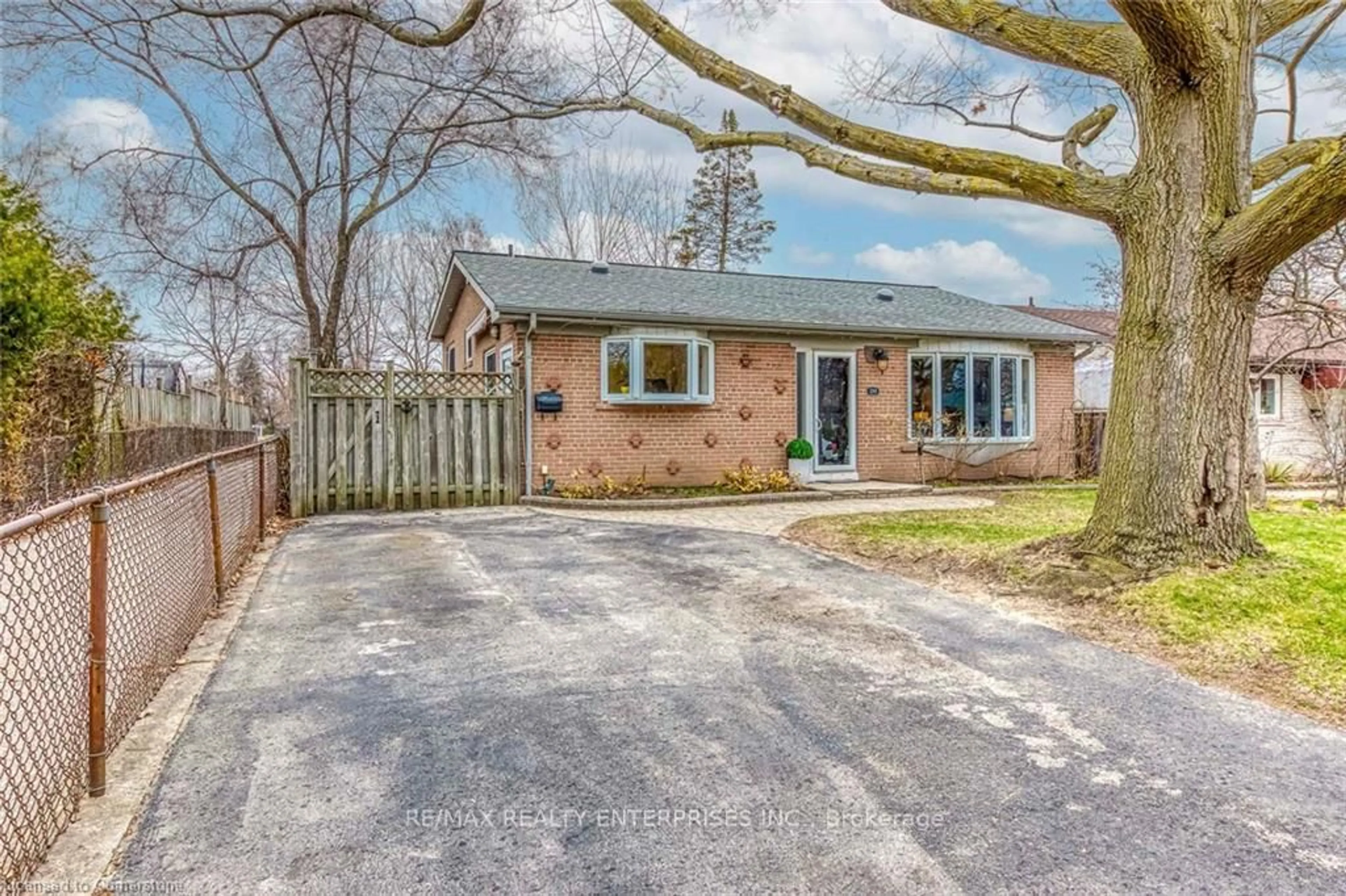 Home with brick exterior material, street for 1293 Lewisham Dr, Mississauga Ontario L5J 3P8
