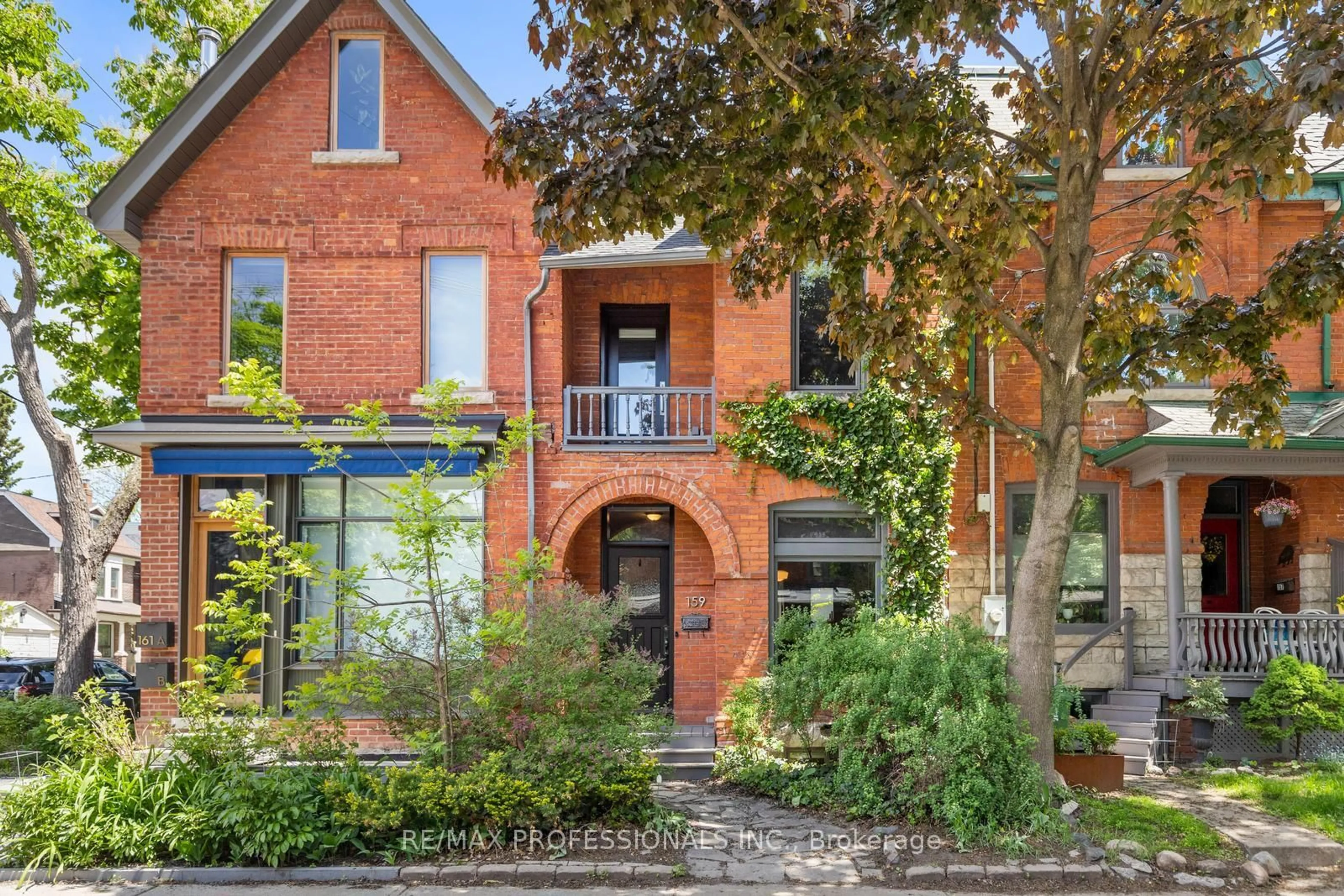 Home with brick exterior material, street for 159 Sorauren Ave, Toronto Ontario M6R 2E6