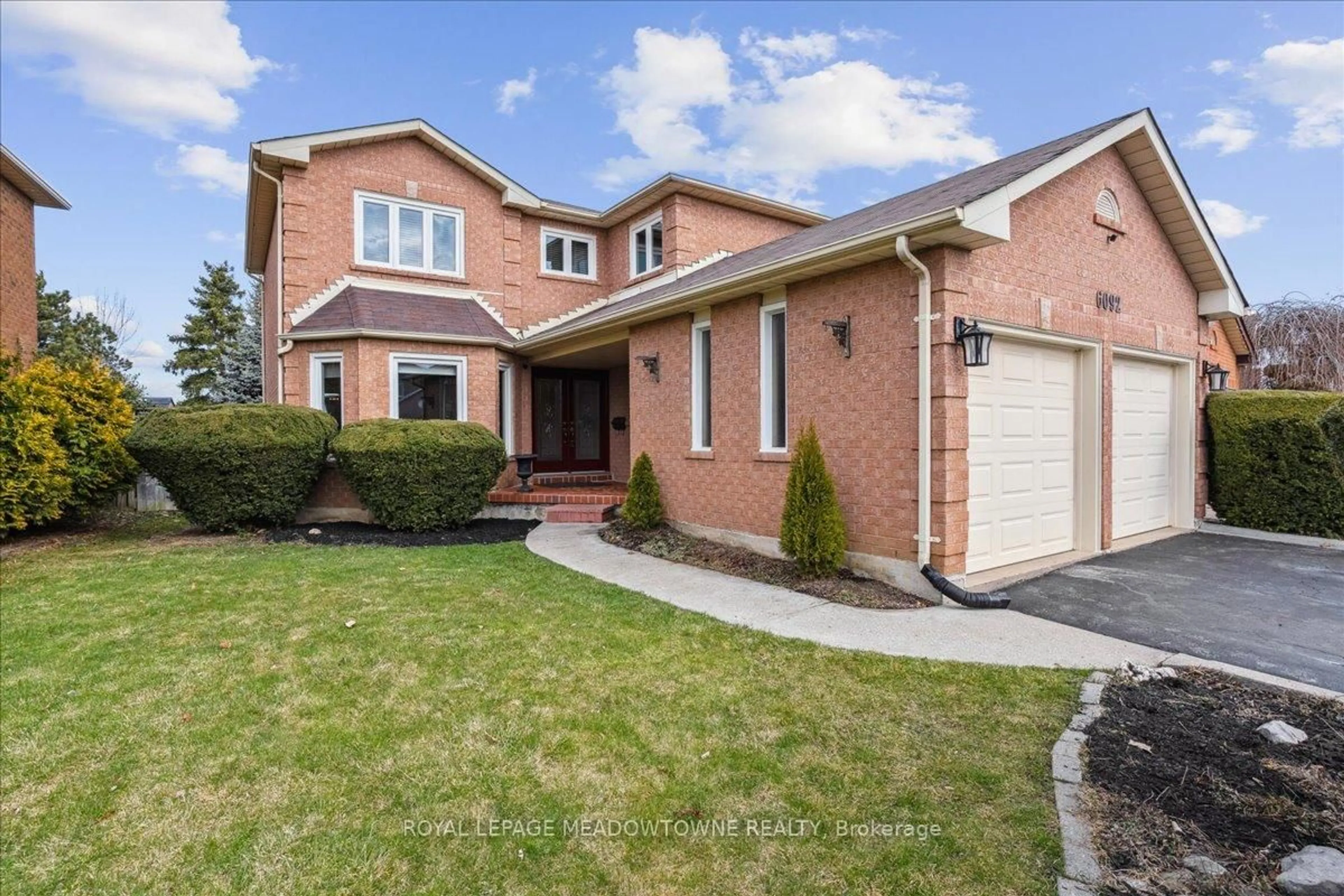 Home with brick exterior material, street for 6092 Osprey Blvd, Mississauga Ontario L5N 5W5