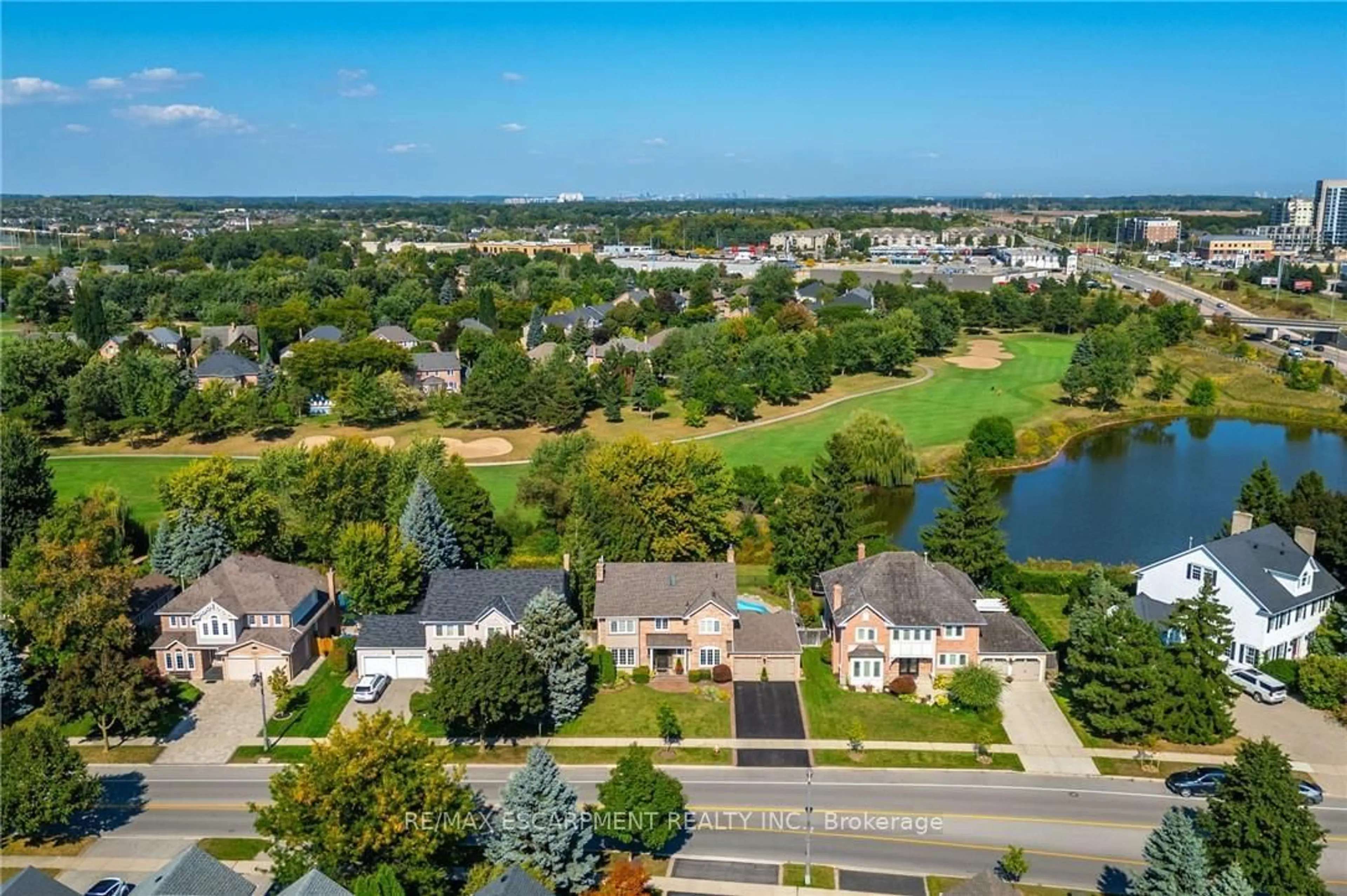 A pic from outside/outdoor area/front of a property/back of a property/a pic from drone, water/lake/river/ocean view for 2049 Country Club Dr, Burlington Ontario L7M 3Z2