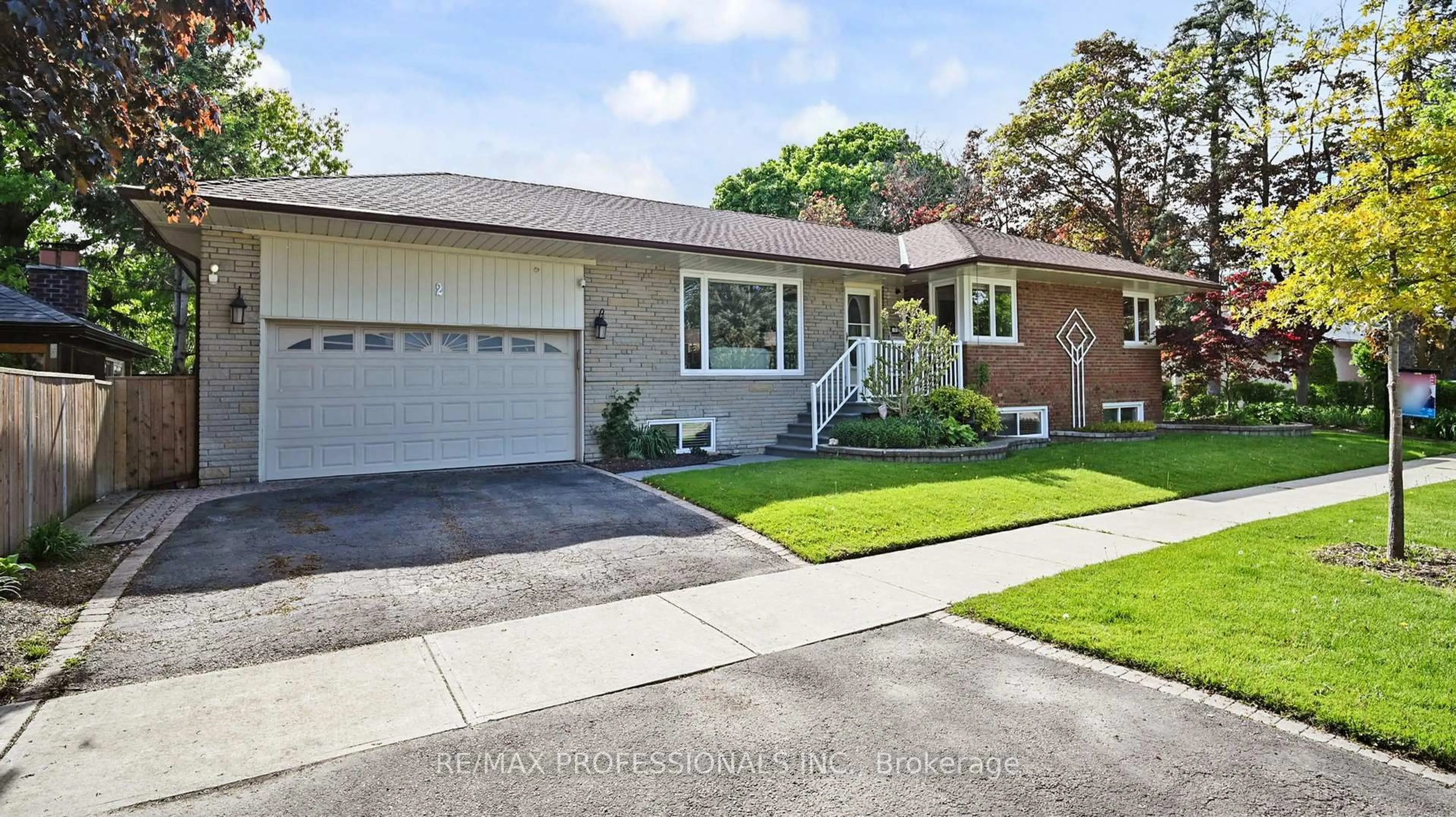 Home with brick exterior material, street for 2 Woodpark Rd, Toronto Ontario M9P 1M1