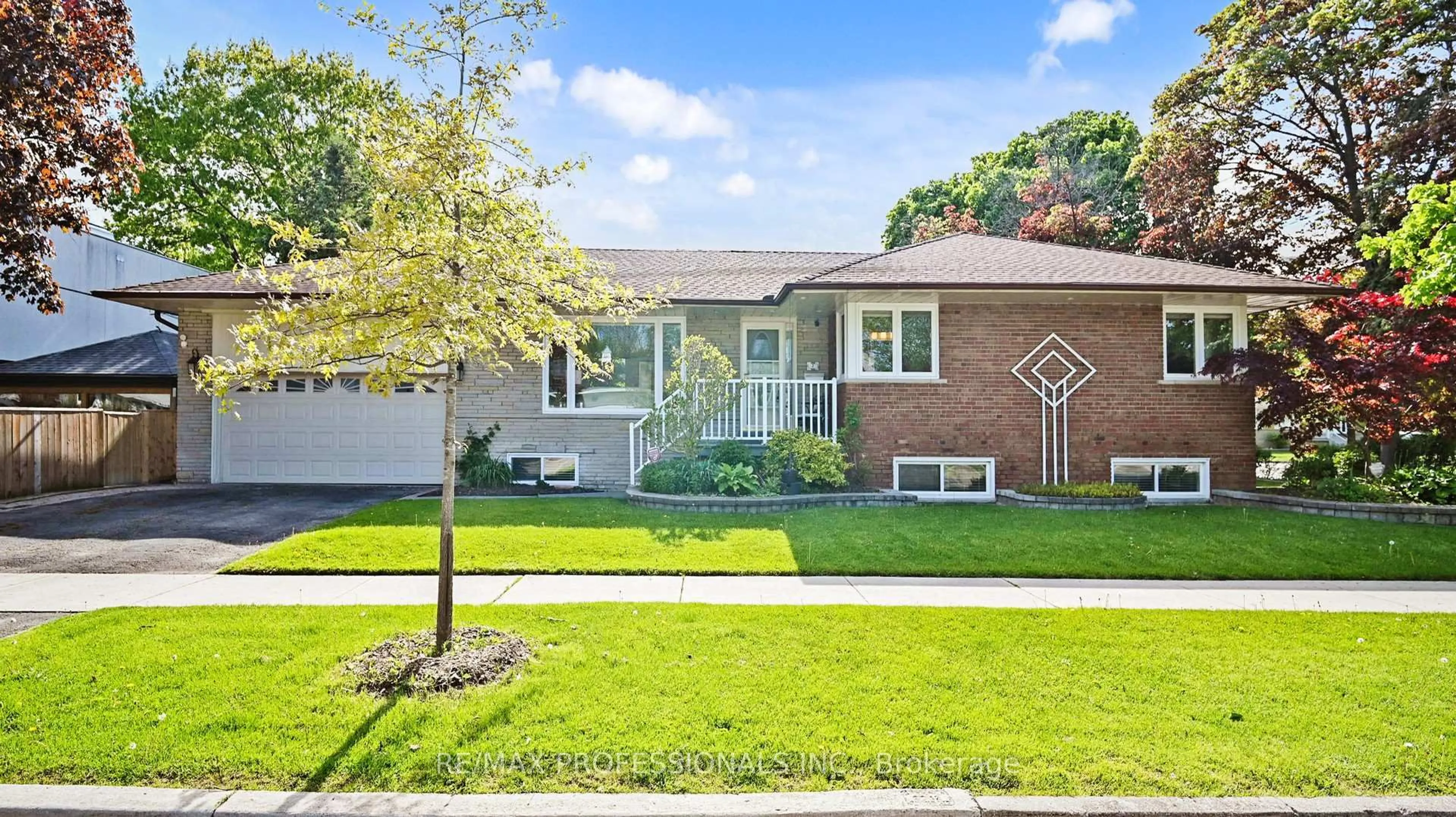 Home with brick exterior material, street for 2 Woodpark Rd, Toronto Ontario M9P 1M1