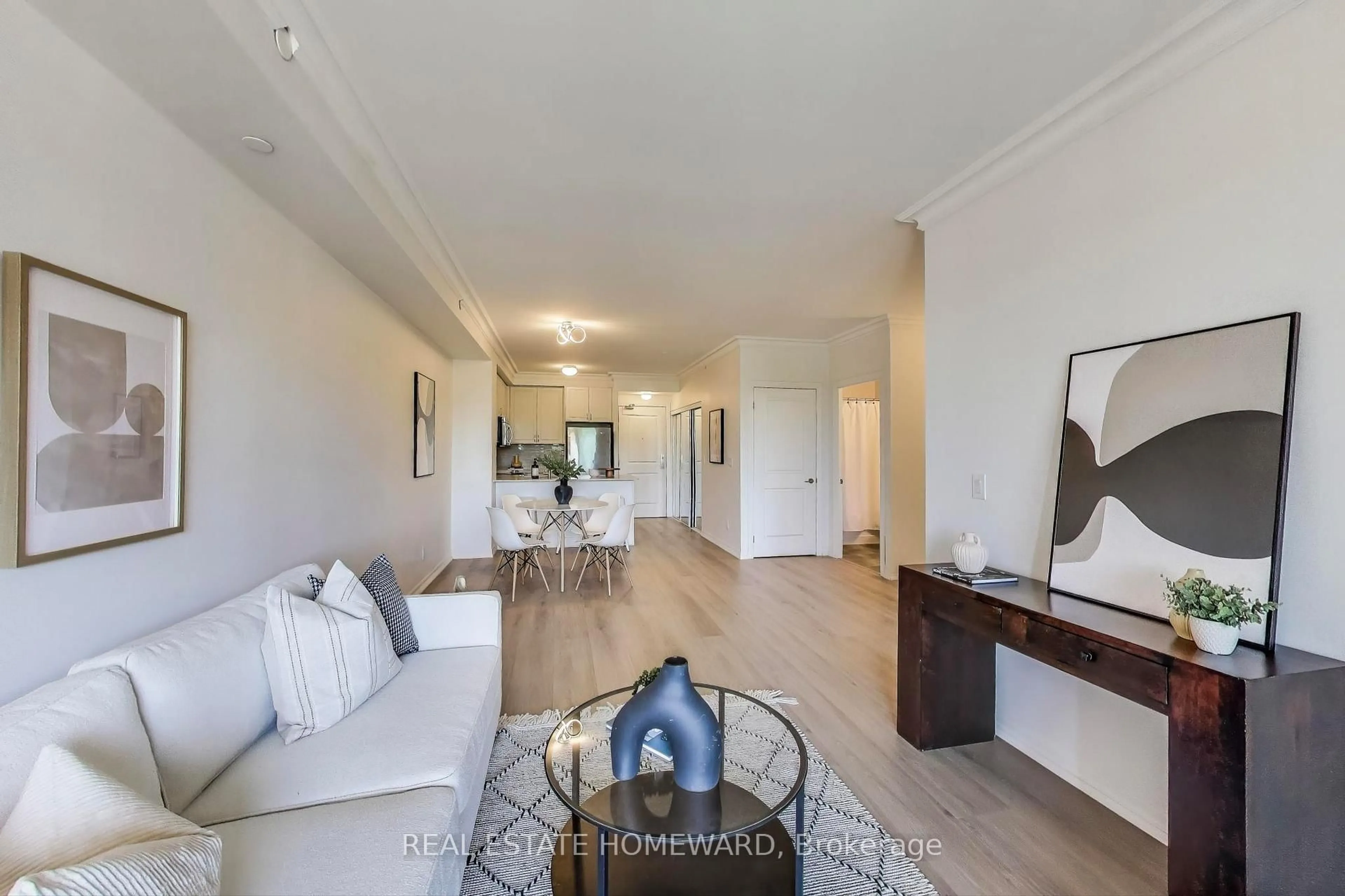 Living room with furniture, wood/laminate floor for 3563 Lake Shore Blvd #214, Toronto Ontario M8W 0A3