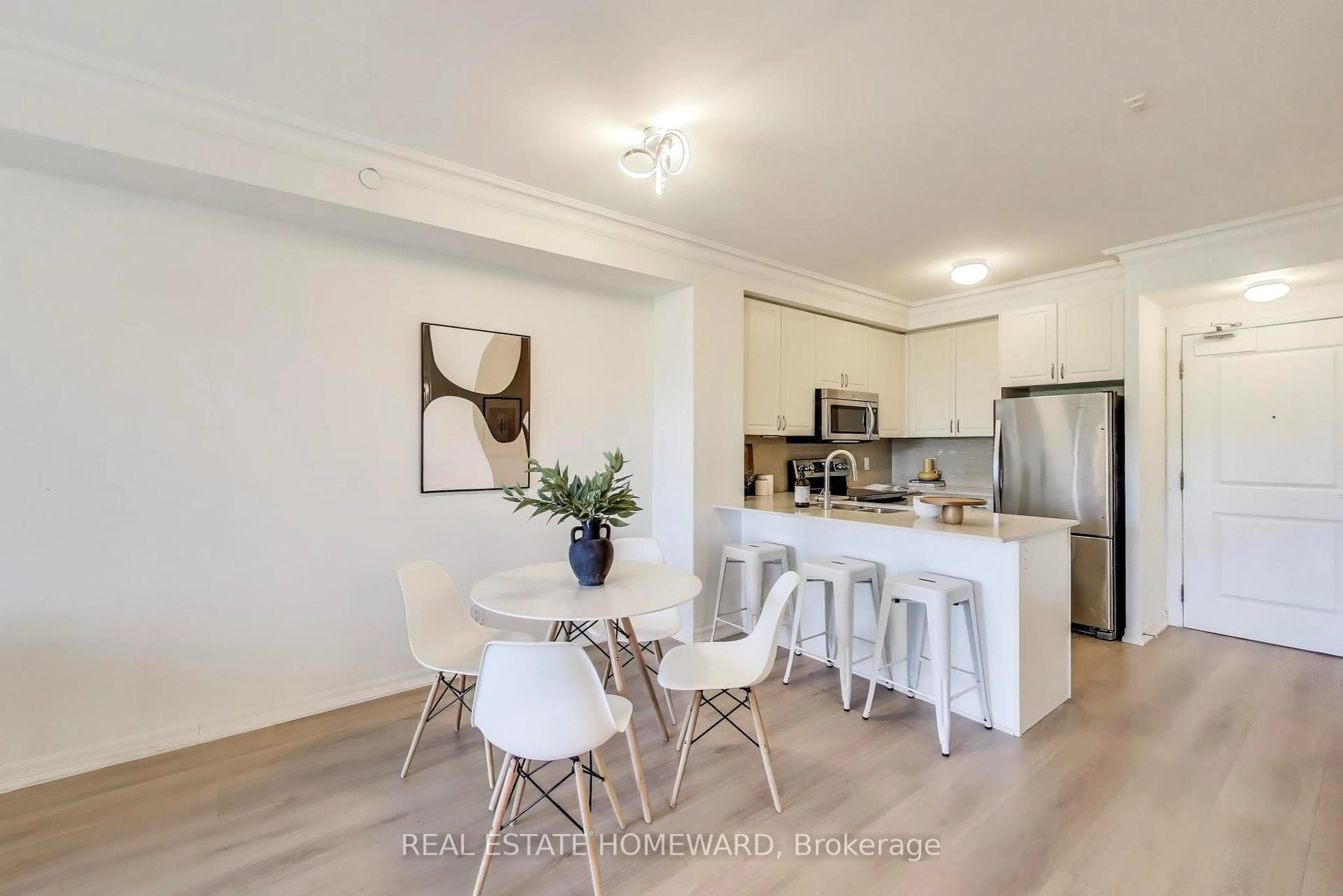 Open concept kitchen, wood/laminate floor for 3563 Lake Shore Blvd #214, Toronto Ontario M8W 0A3