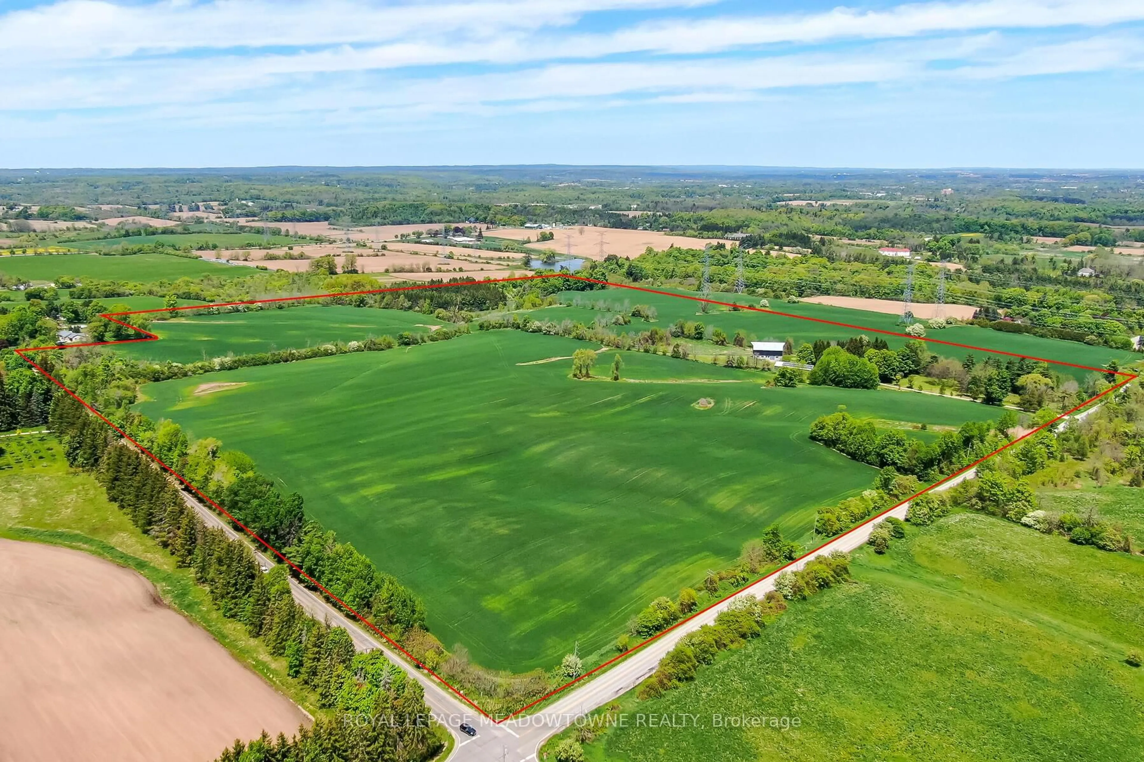 A pic from outside/outdoor area/front of a property/back of a property/a pic from drone, unknown for 10319 15 Sdrd, Halton Hills Ontario L7G 4S6