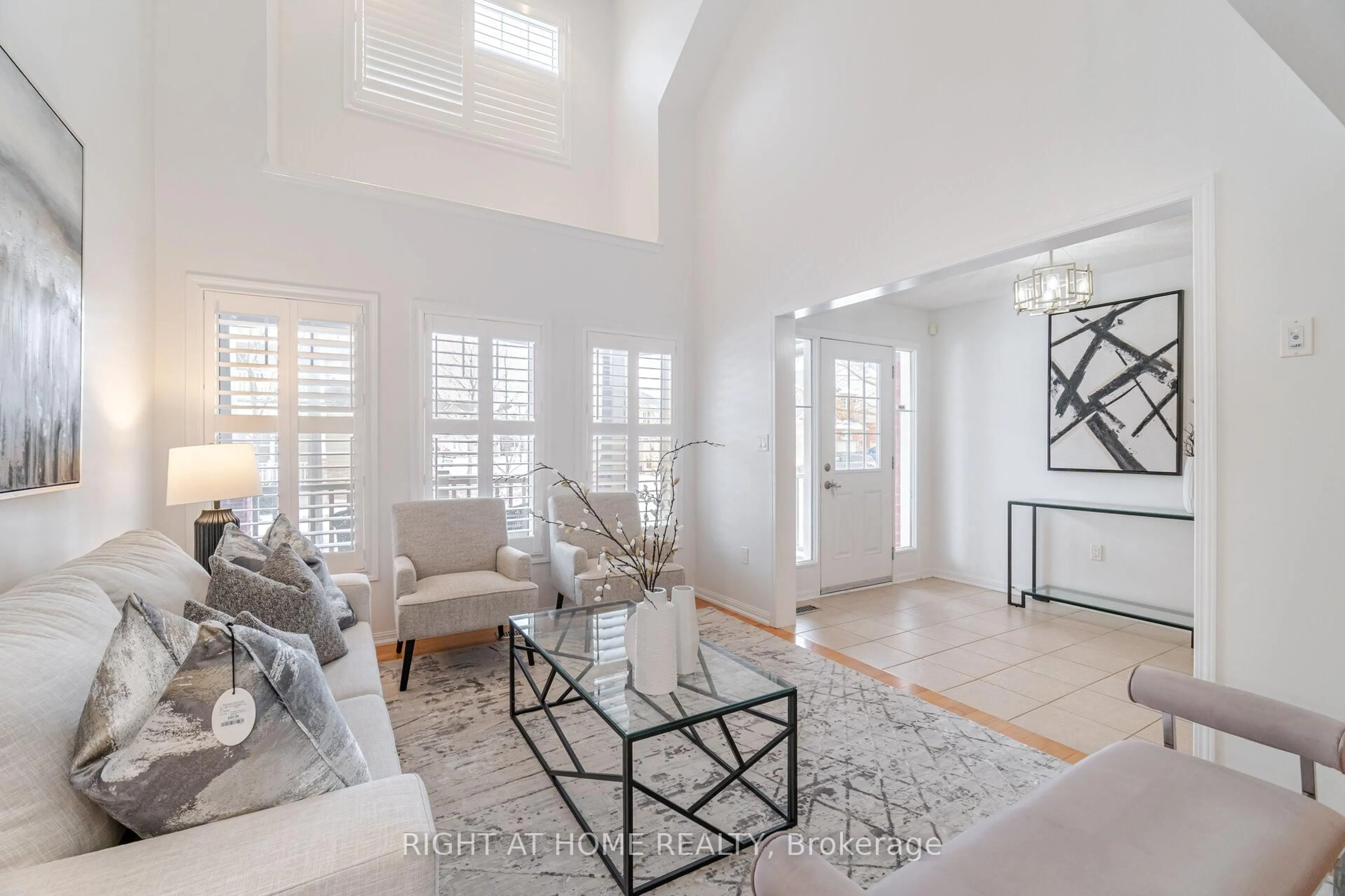 Living room with furniture, ceramic/tile floor for 820 Rayner Crt, Milton Ontario L9T 0N8