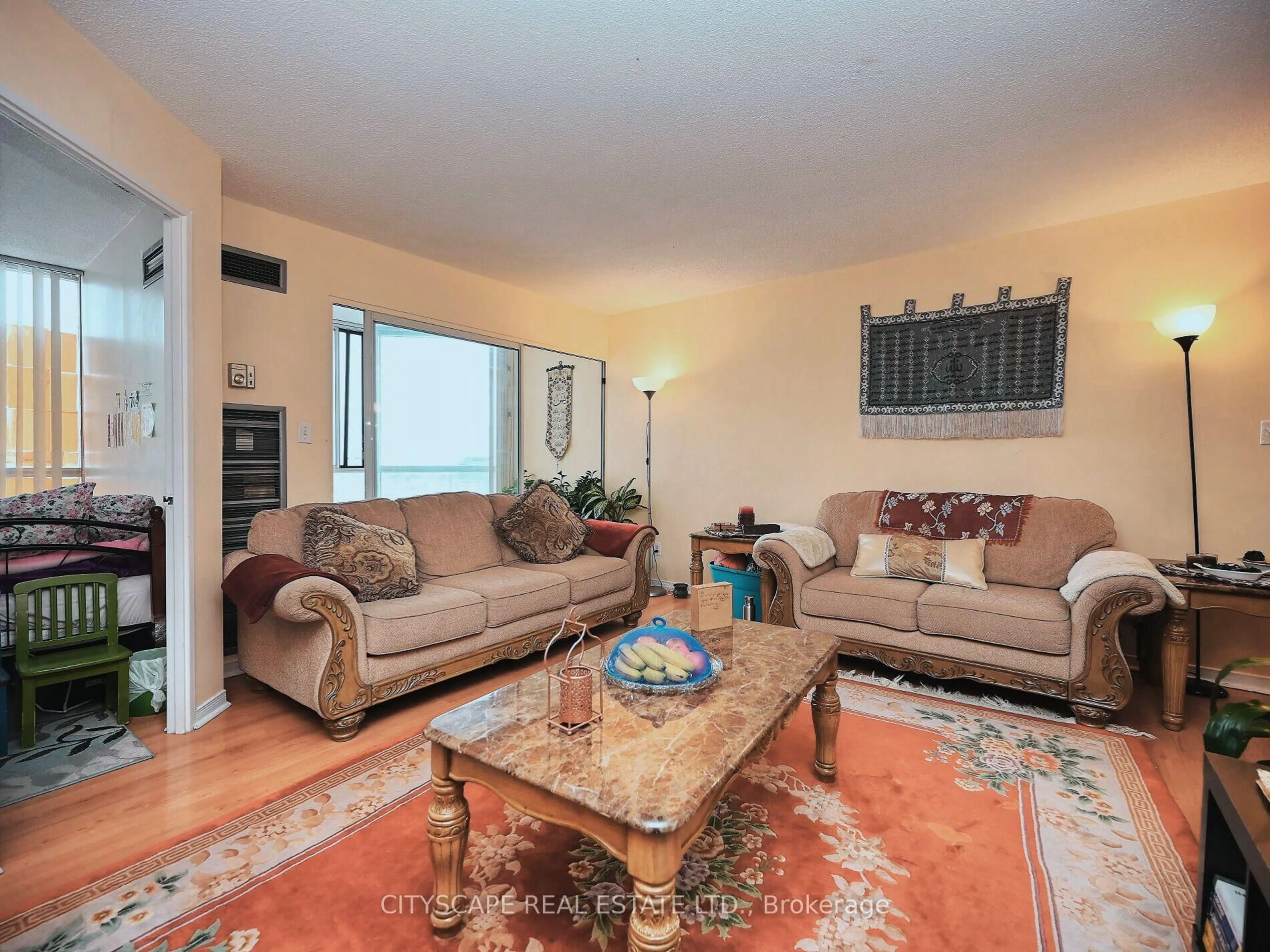 Living room with furniture, unknown for 145 Hillcrest Ave #1205, Mississauga Ontario L5B 3Z1