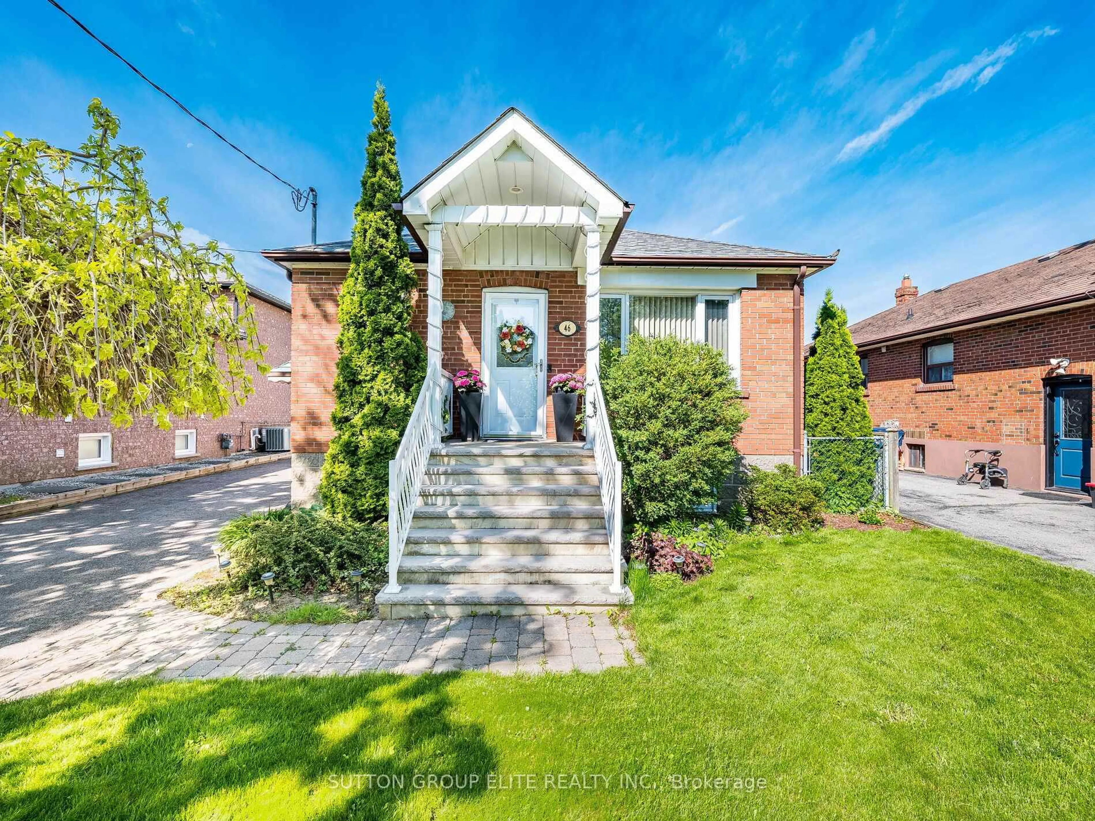 Home with brick exterior material, street for 46 Loma Rd, Toronto Ontario M8Z 3Z7