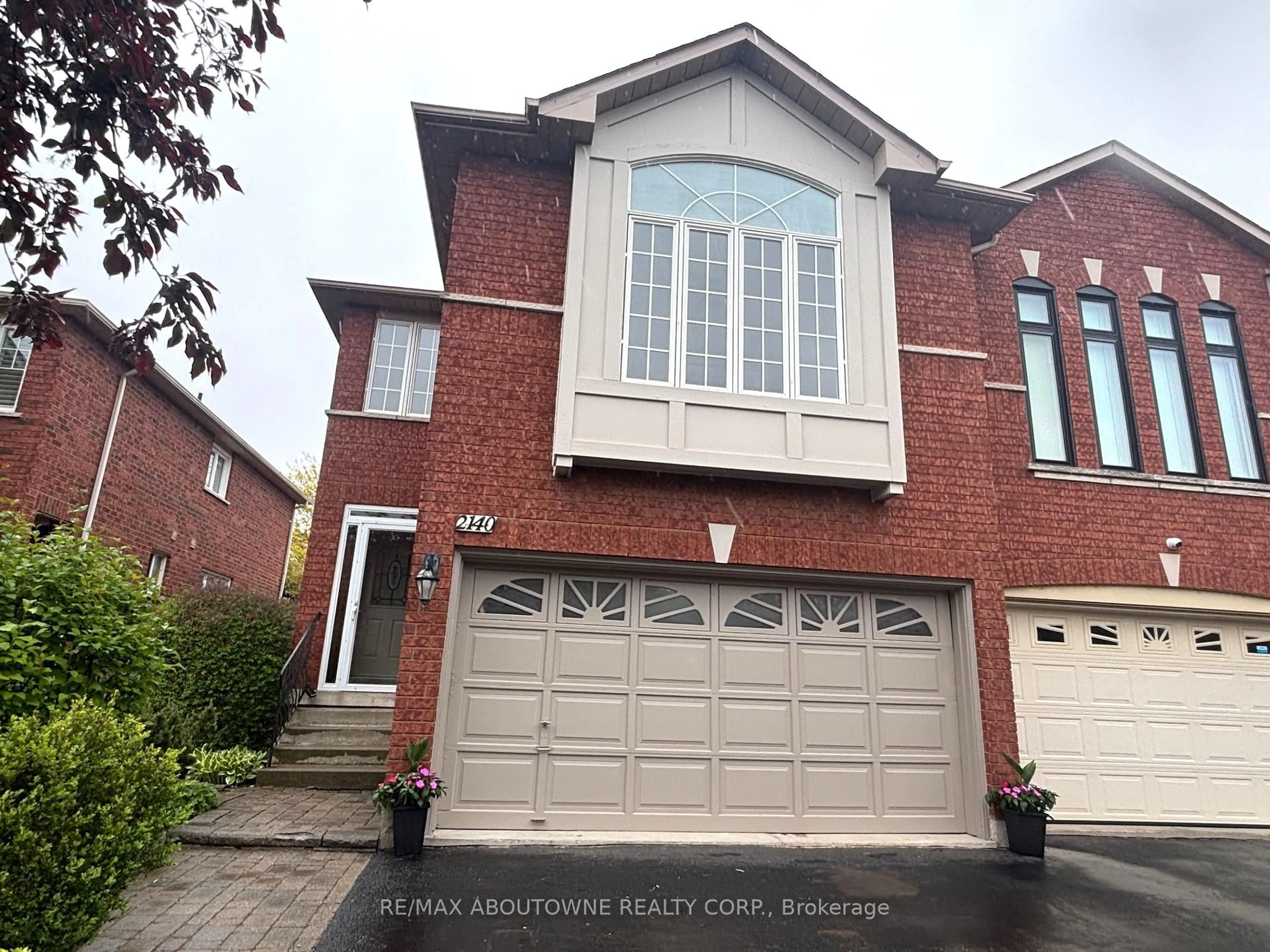 Home with brick exterior material, street for 2140 GLENHAMPTON Rd, Oakville Ontario L6M 3X1