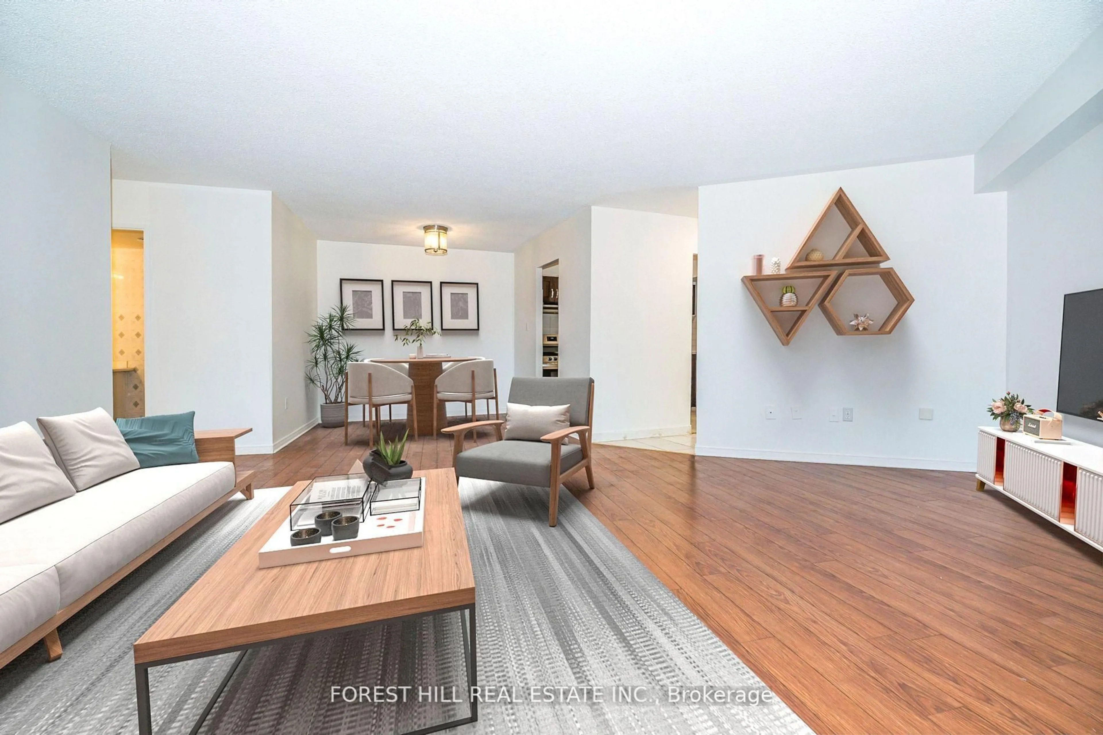 Living room with furniture, unknown for 330 Dixon Rd #207, Toronto Ontario M9R 1S9