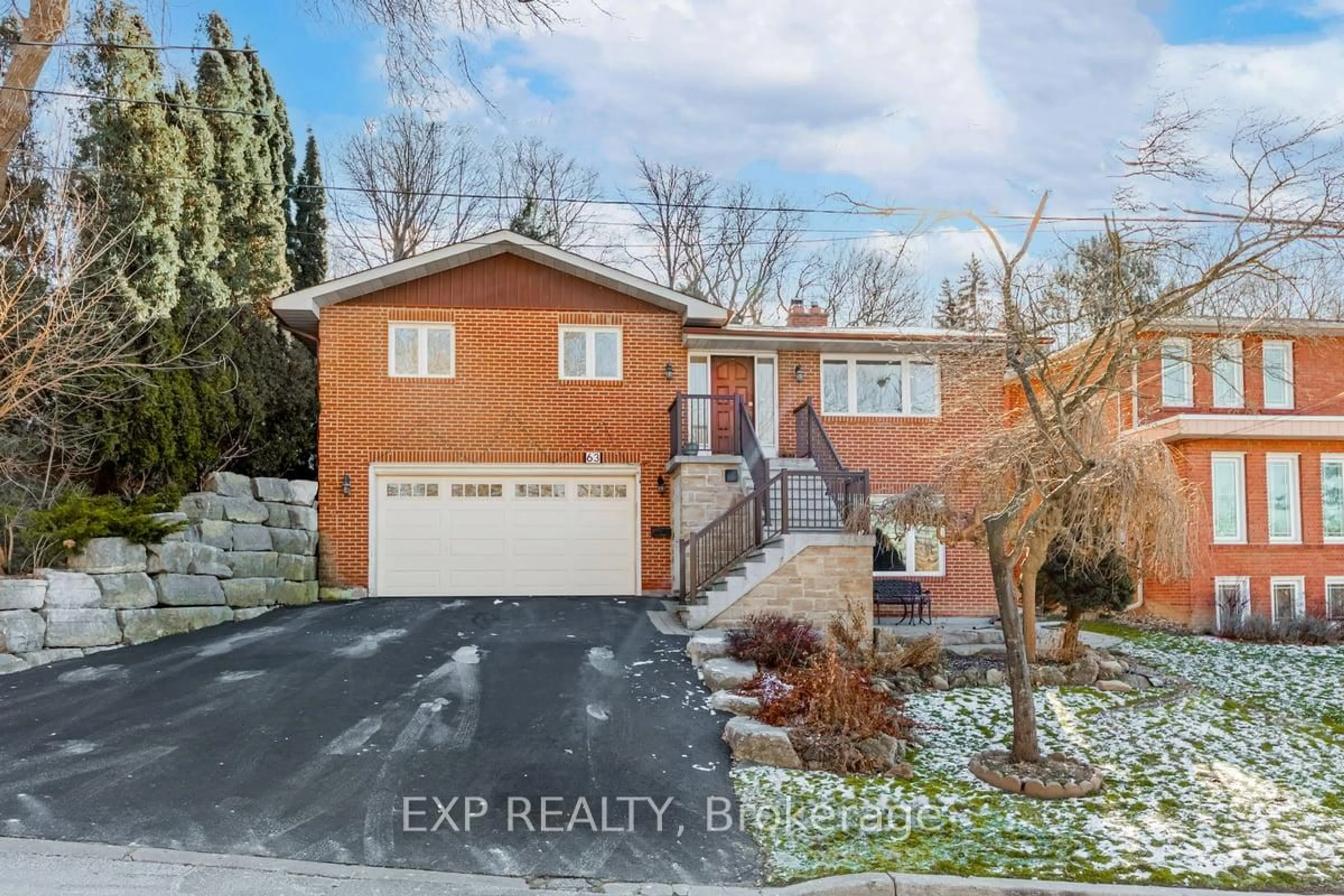Home with brick exterior material, street for 63 Riverside Dr, Toronto Ontario M9L 1J2