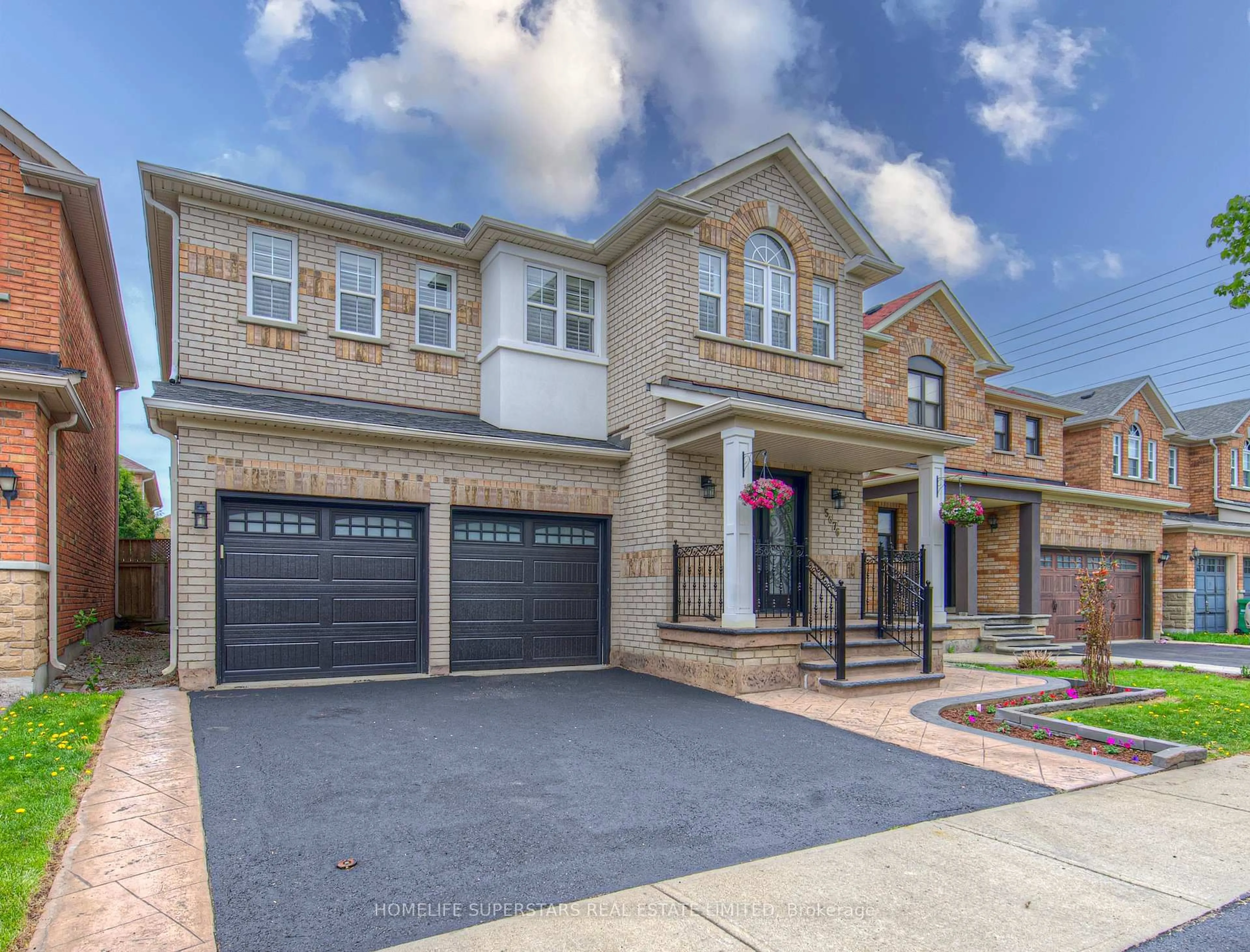 Home with brick exterior material, street for 5676 Fantasia Manr, Mississauga Ontario L5M 7B1
