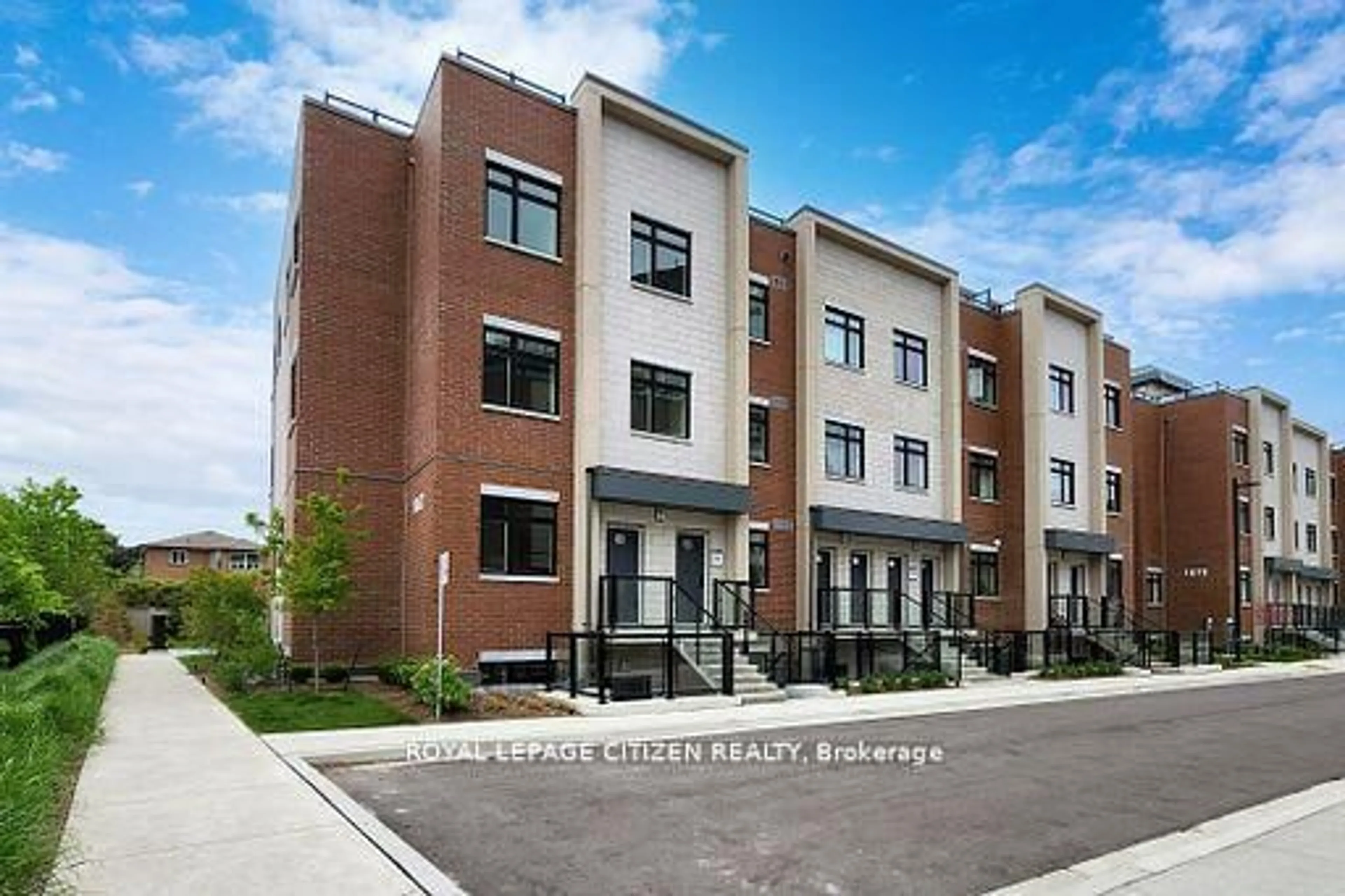 Home with brick exterior material, street for 1062 Douglas Mccurdy Comm N/A #125, Mississauga Ontario L5G 0C6