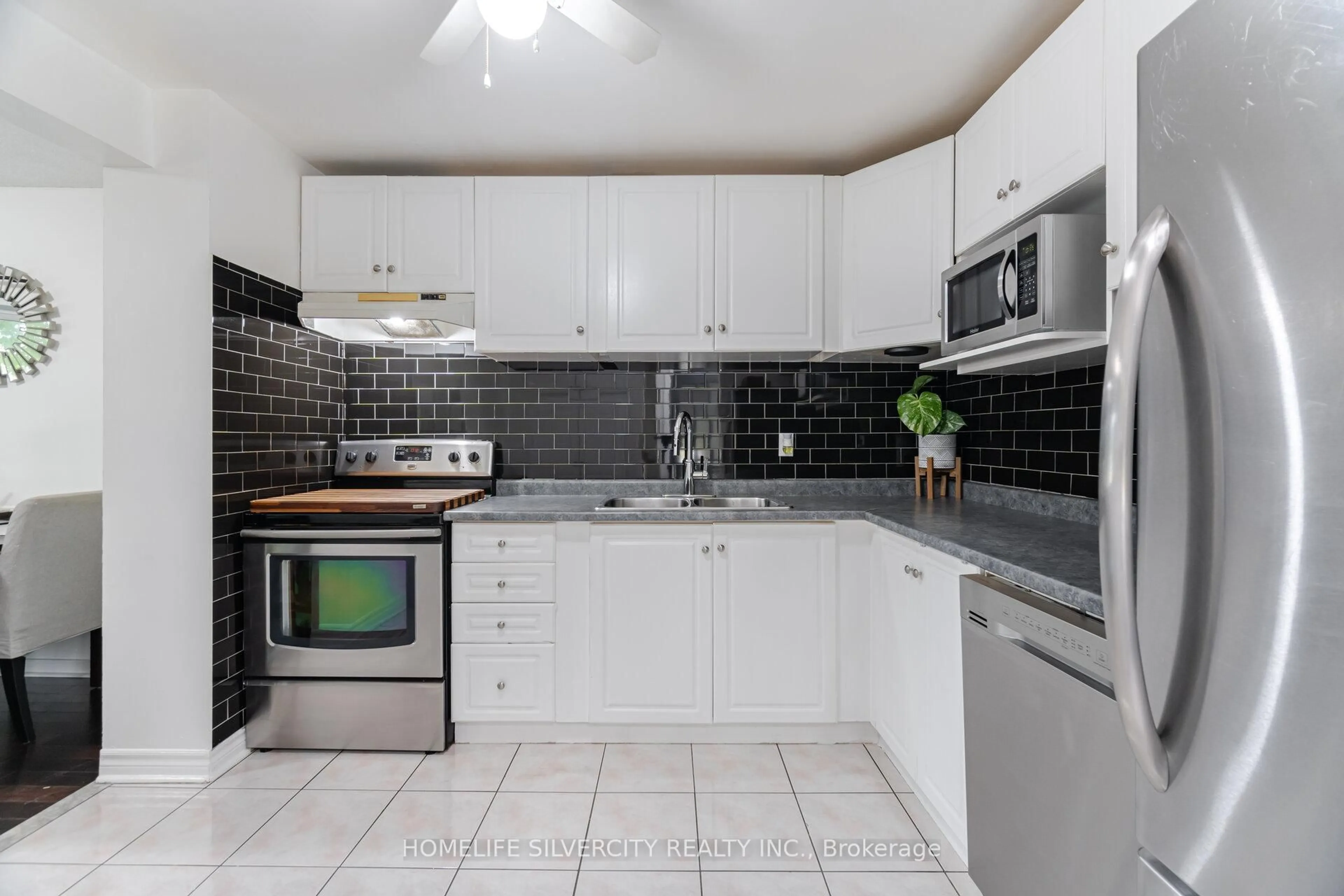 Standard kitchen, ceramic/tile floor for 3500 Glen erin Dr #7, Mississauga Ontario L5L 1W6