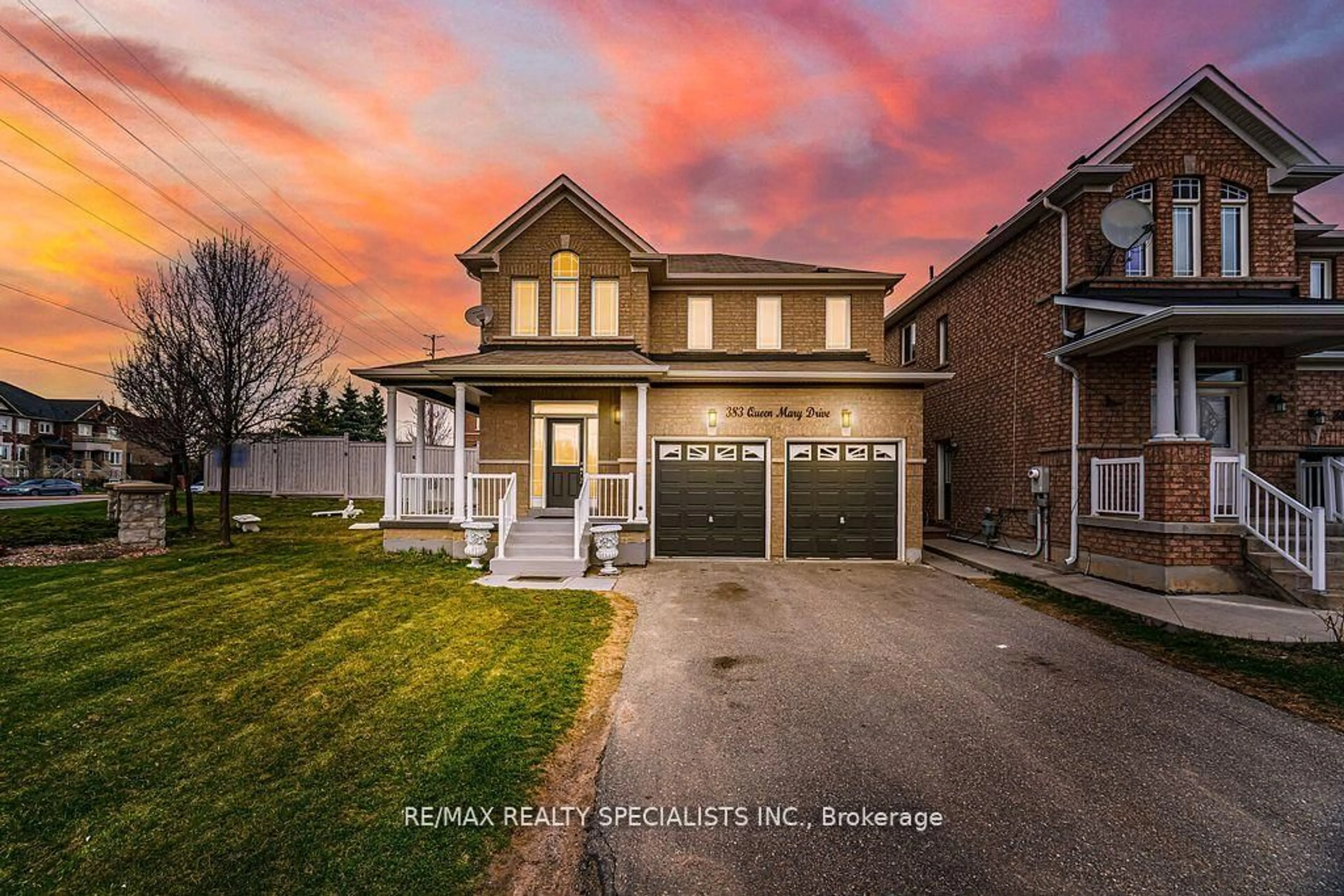 Home with brick exterior material, street for 383 Queen Mary Dr, Brampton Ontario L7A 3T1