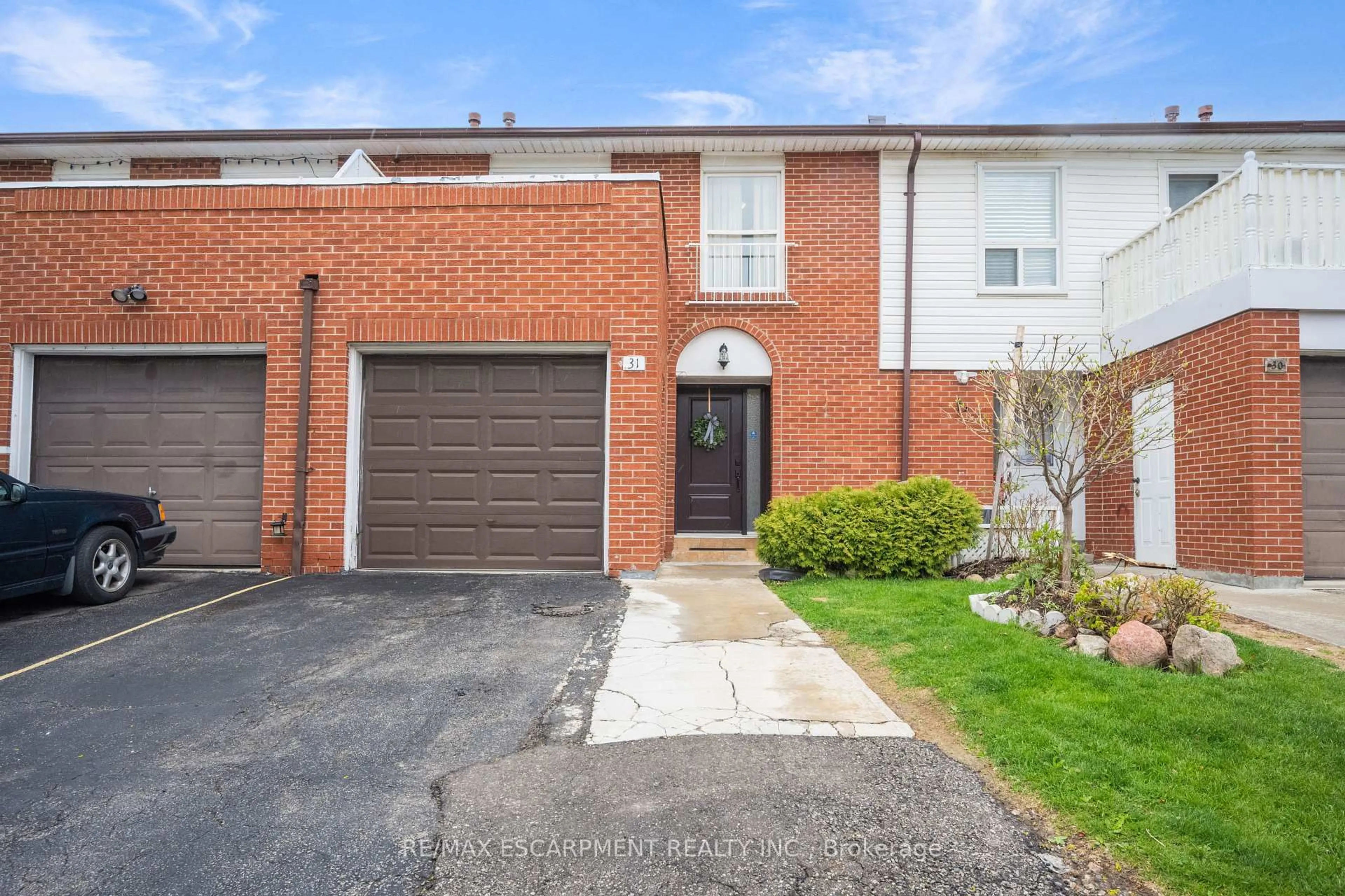 Home with brick exterior material, street for 3430 Brandon Gate Dr #31, Mississauga Ontario L4T 3T4