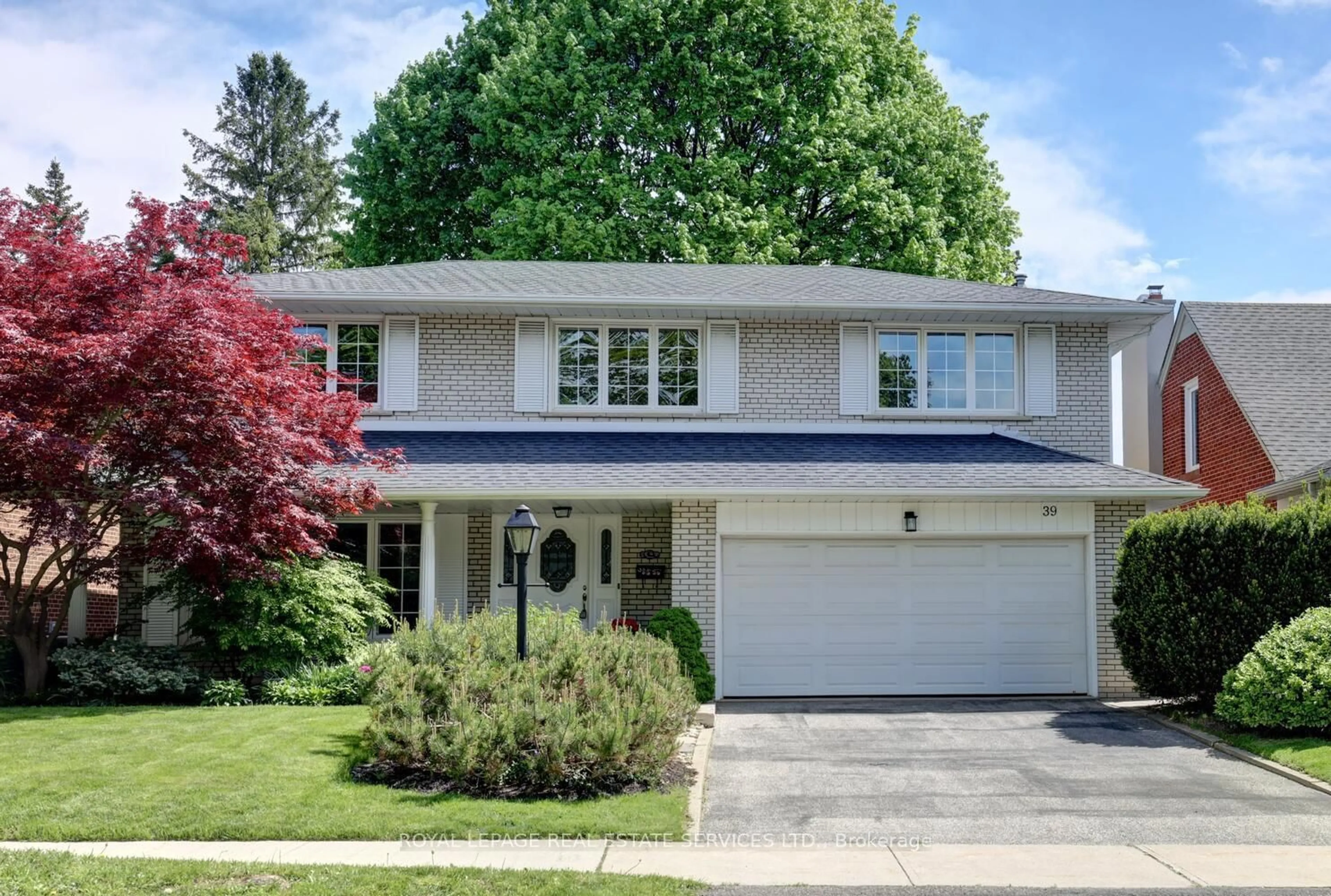 Home with vinyl exterior material, street for 39 Pettit Dr, Toronto Ontario M9R 2W6